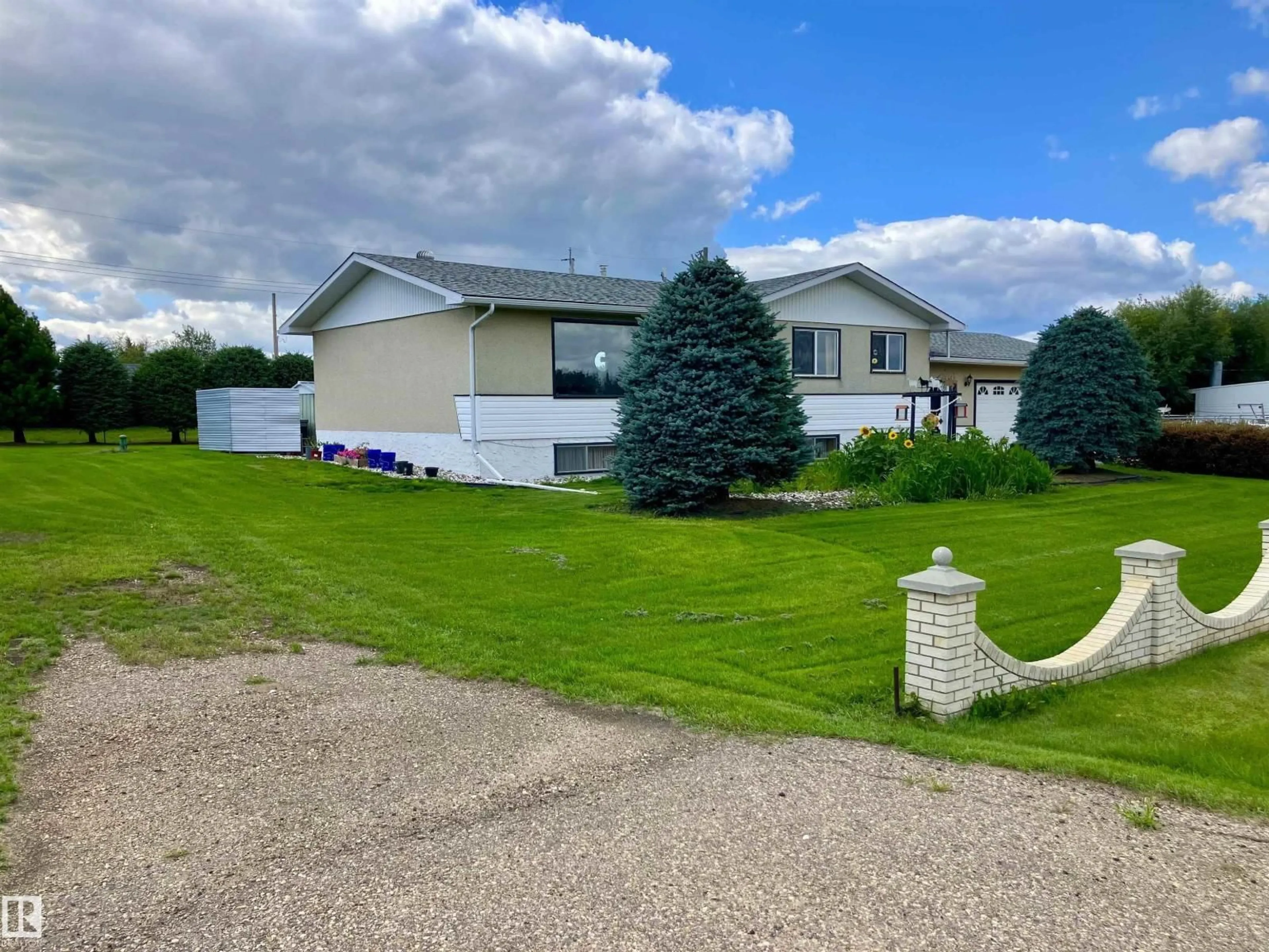 A pic from outside/outdoor area/front of a property/back of a property/a pic from drone, unknown for 175 - 15 HWY, Rural Lamont County Alberta T0B3H0