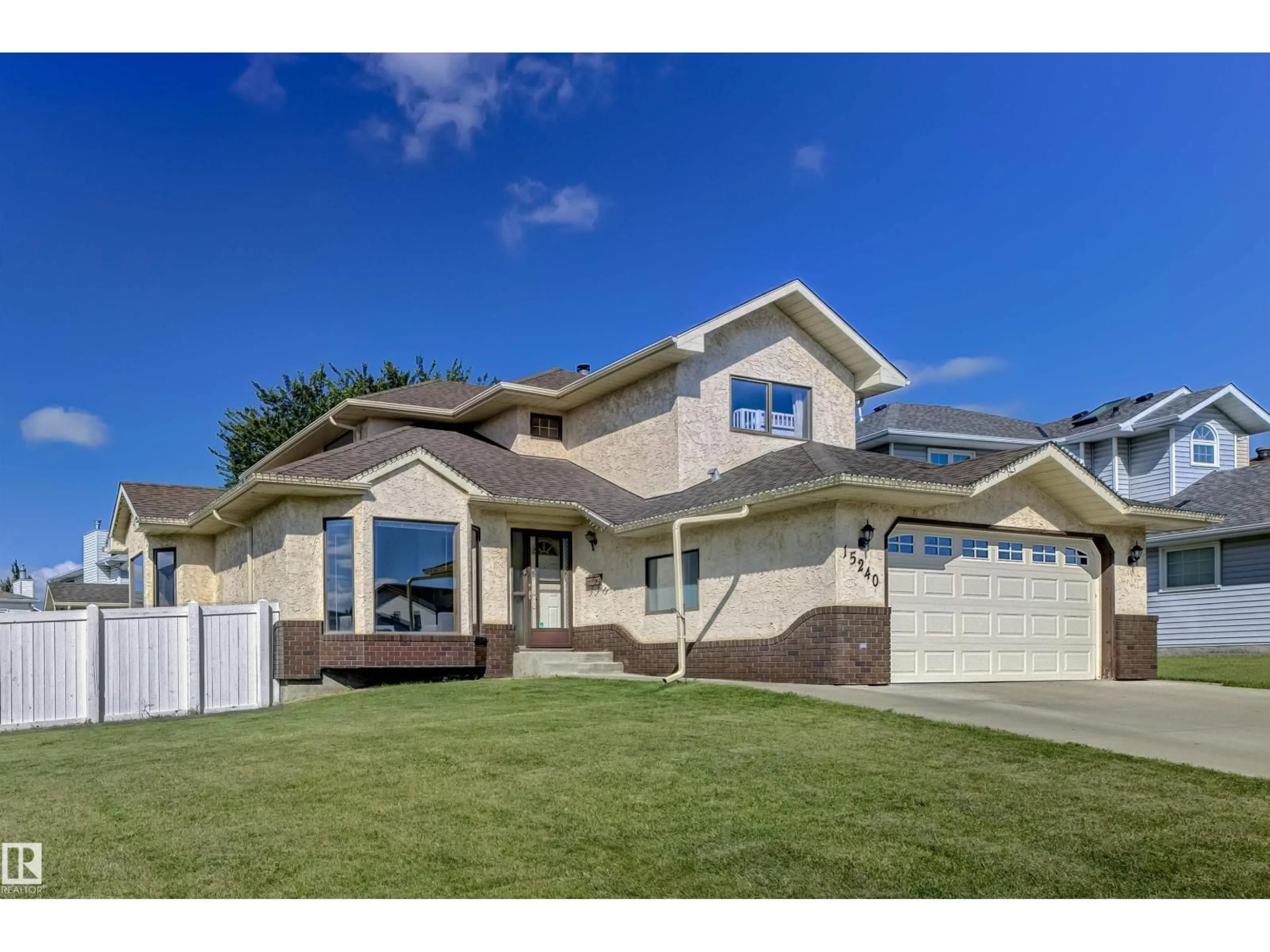 Home with vinyl exterior material, street for NW - 15240 59A ST, Edmonton Alberta T5A4X5