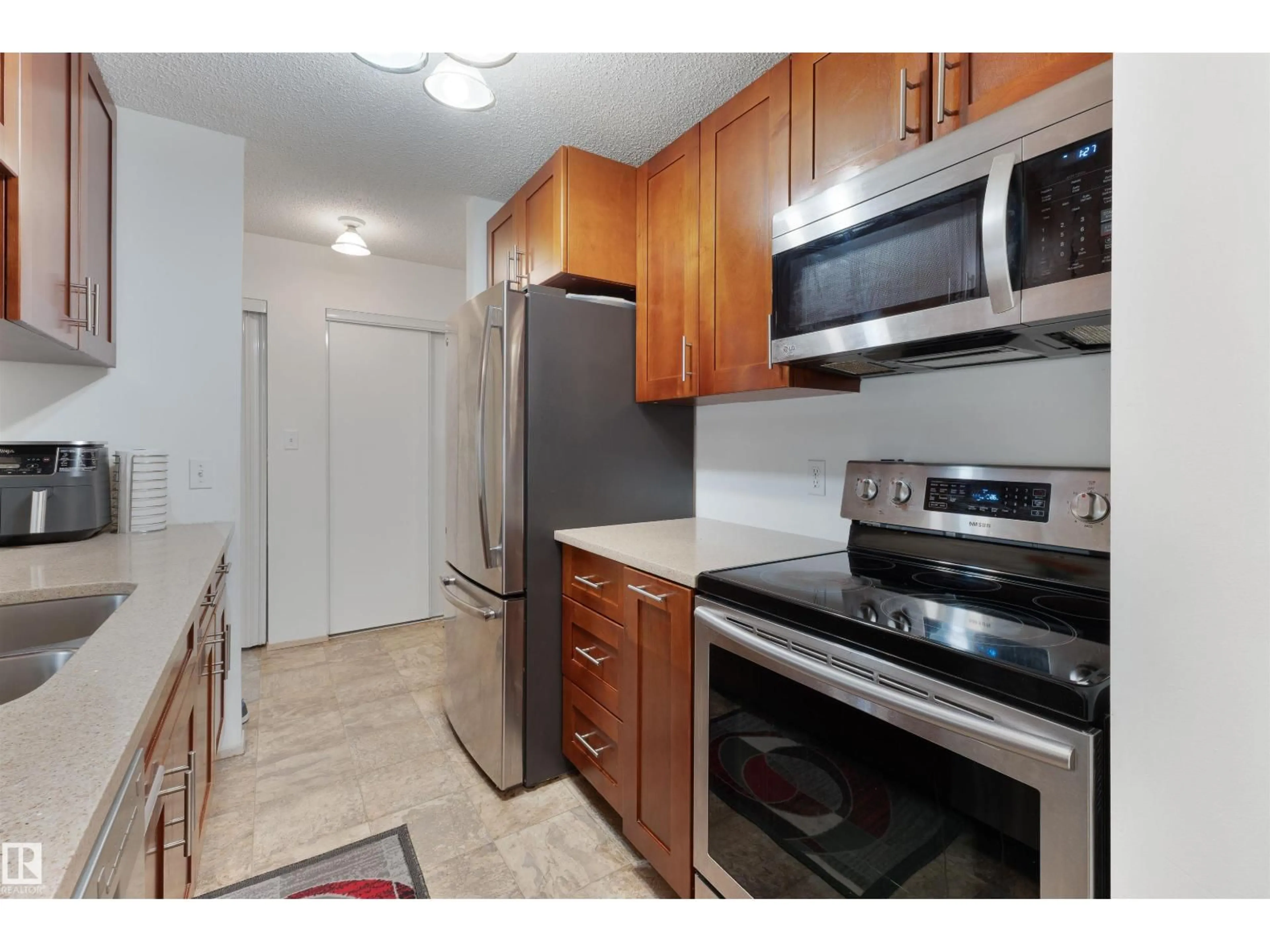 Standard kitchen, unknown for #204 - 4220 139 AV, Edmonton Alberta T5Y2Y2