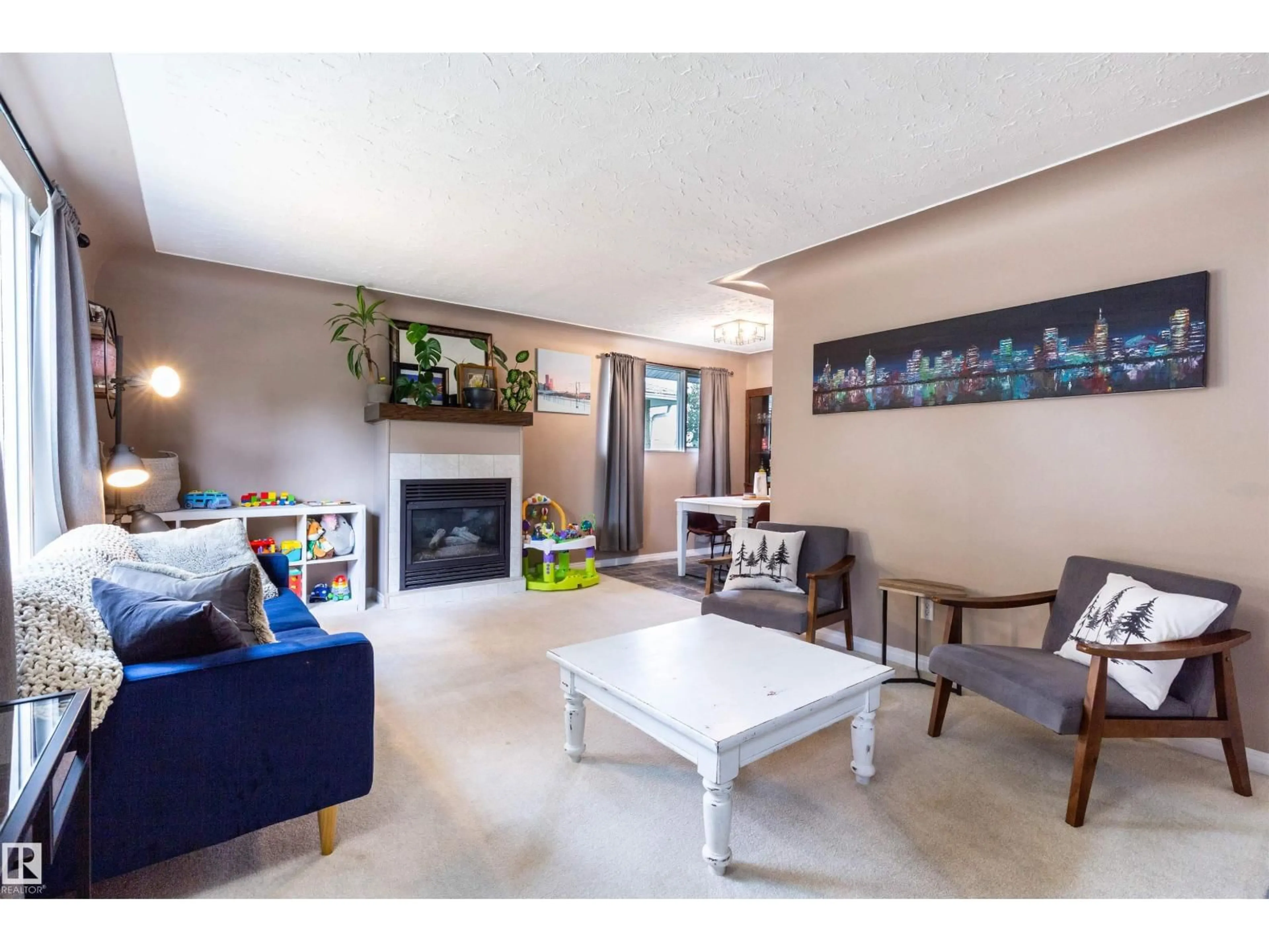 Living room with furniture, unknown for 12433 134 ST NW, Edmonton Alberta T5L1V3