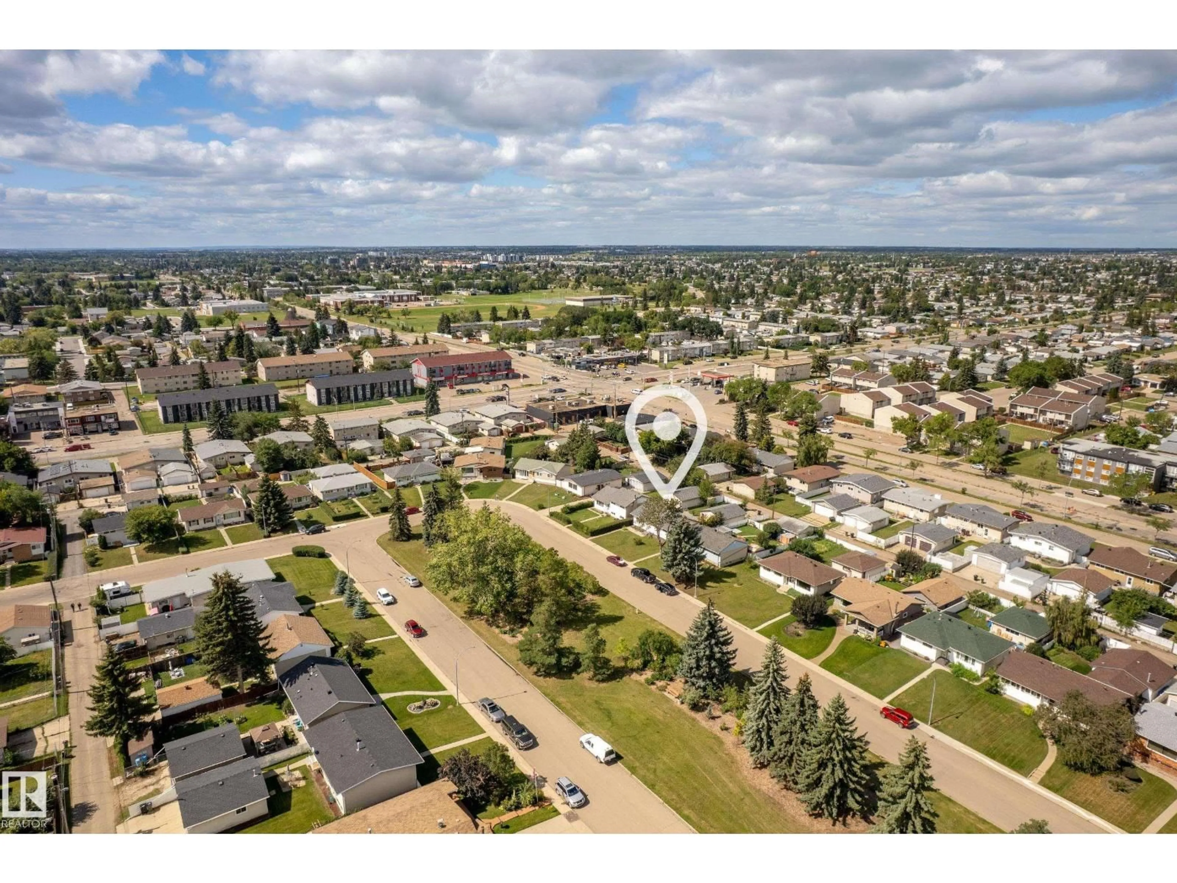 A pic from outside/outdoor area/front of a property/back of a property/a pic from drone, street for 8016 131A AV, Edmonton Alberta T5C2A3