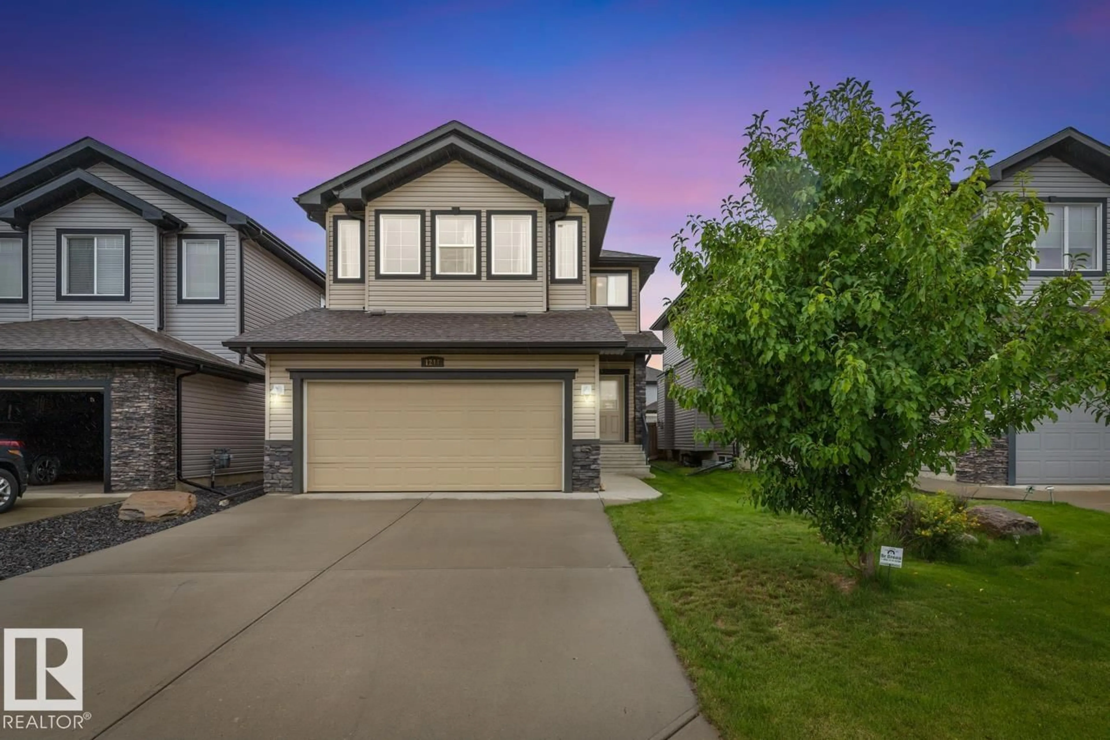 Home with vinyl exterior material, street for 1244 HAYS DR, Edmonton Alberta T6M0M3