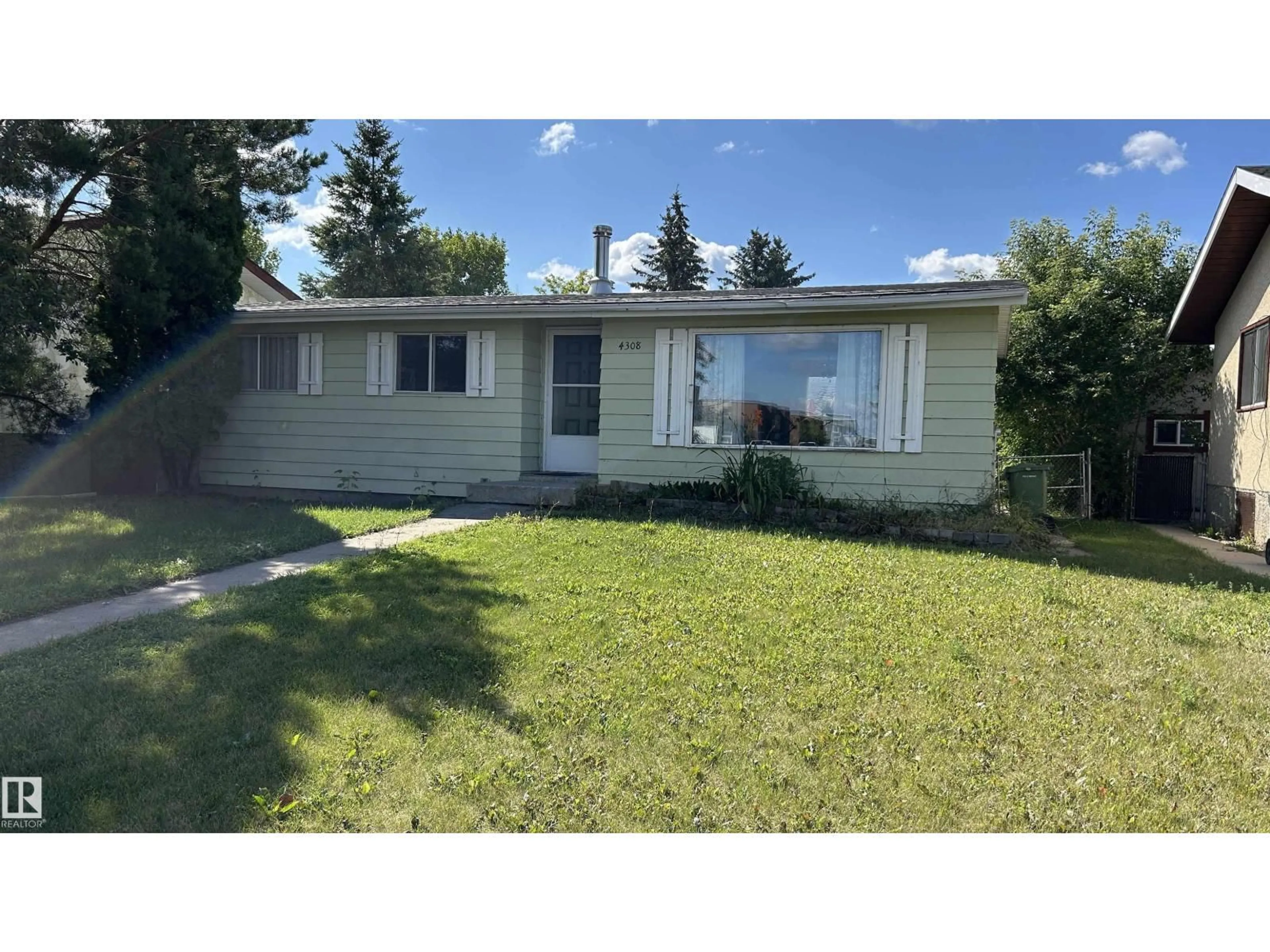 Home with vinyl exterior material, street for 4308 45 AV, Bonnyville Town Alberta T9N1X2