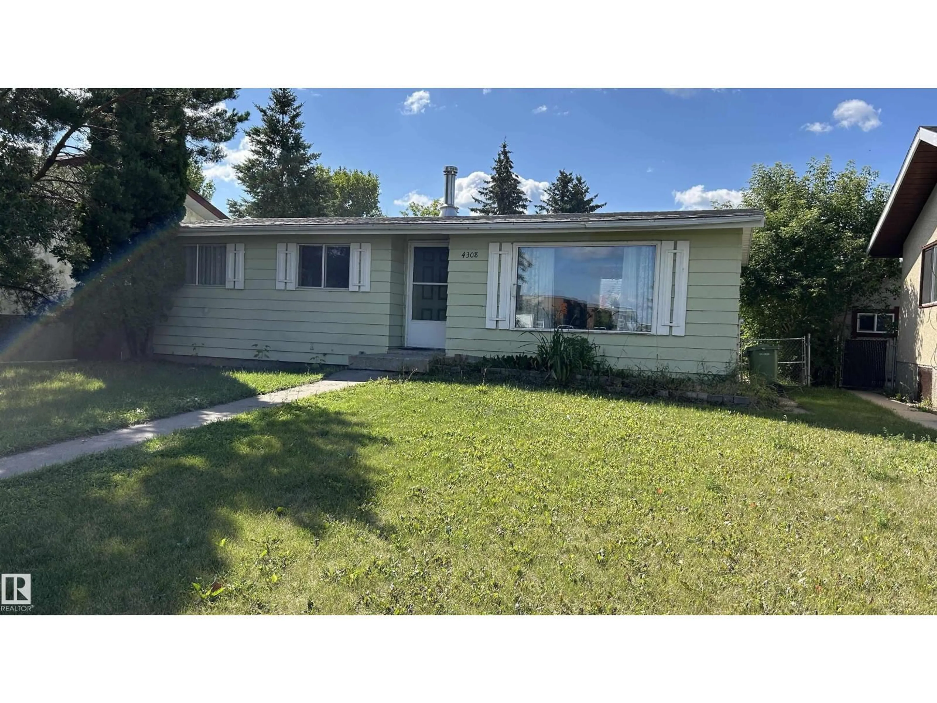 Home with vinyl exterior material, street for 4308 45 AV, Bonnyville Town Alberta T9N1X2