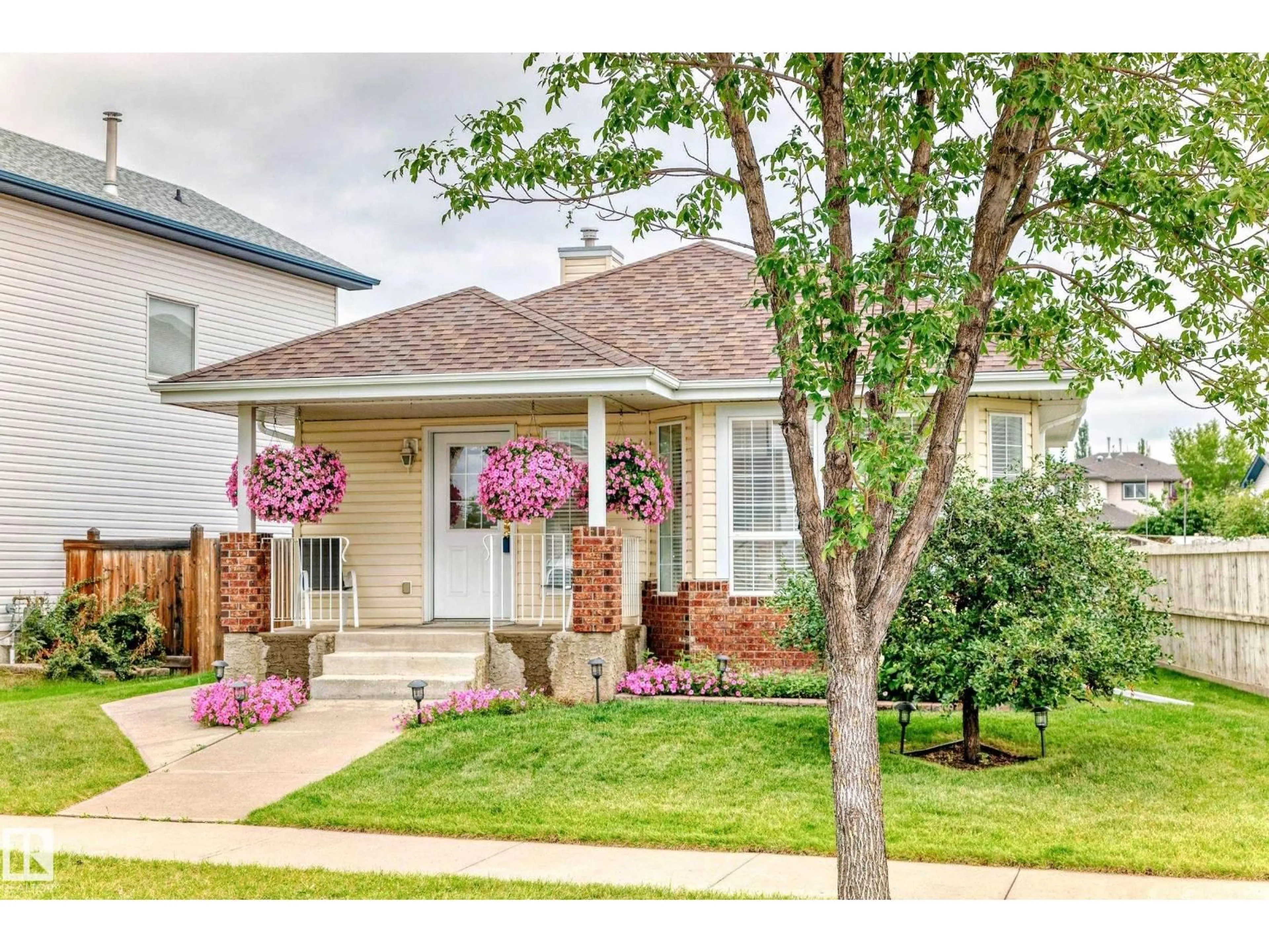 Home with vinyl exterior material, street for NW - 17215 88 ST, Edmonton Alberta T5Z3R5