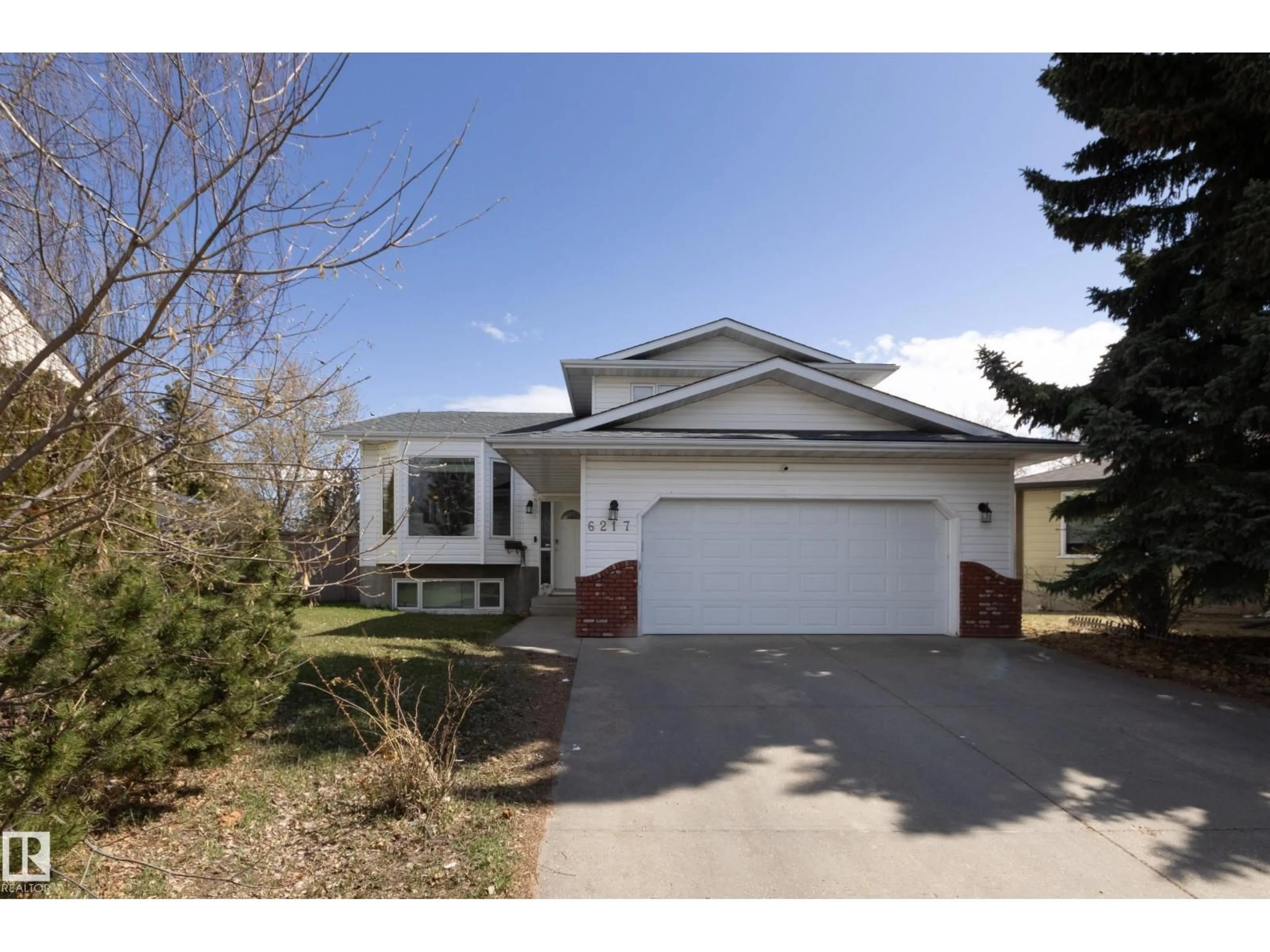 Home with vinyl exterior material, street for 6217 13 AV, Edmonton Alberta T6L2E5