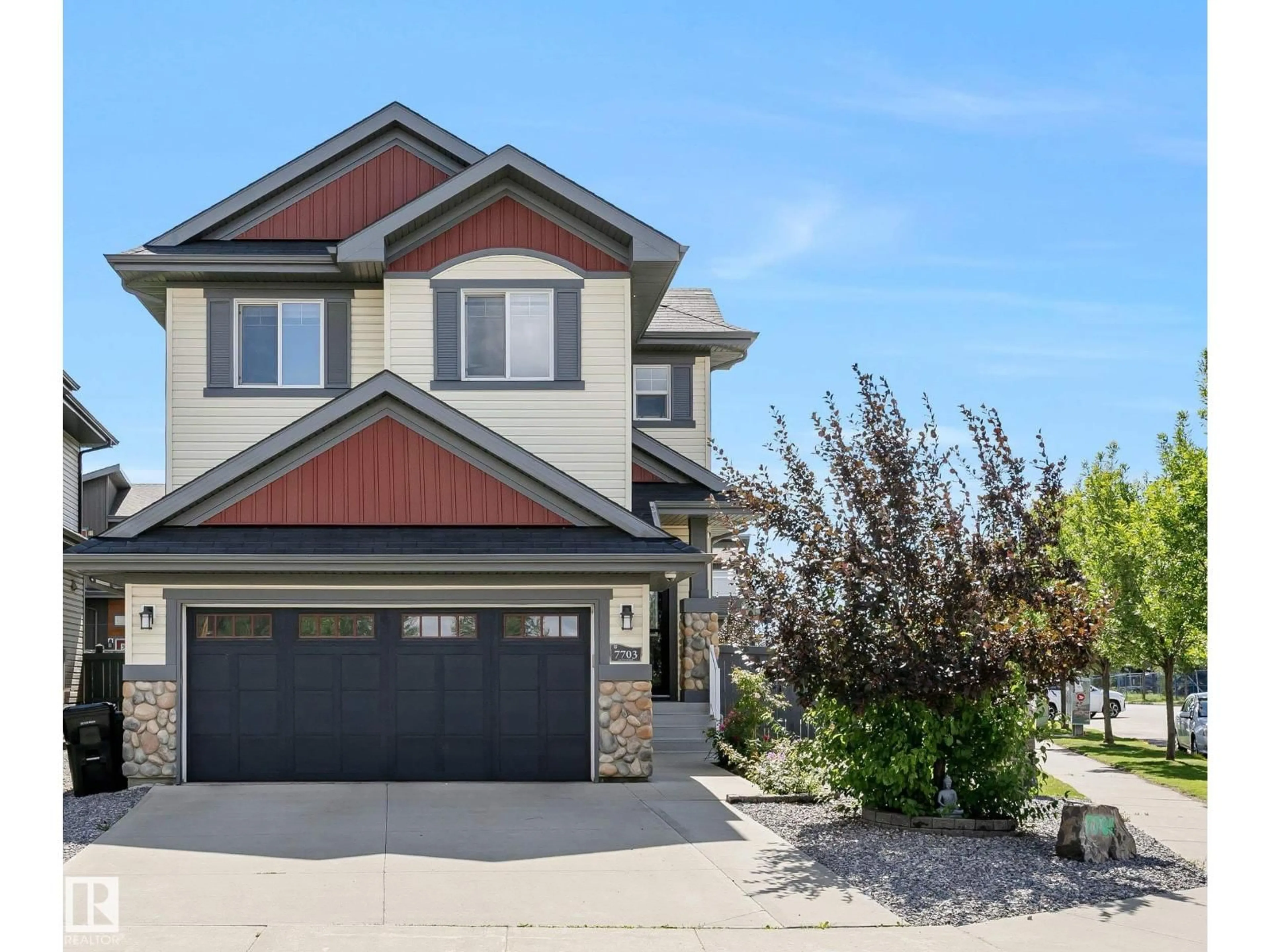 Home with vinyl exterior material, street for NW - 7703 GETTY WD, Edmonton Alberta T5T4K9
