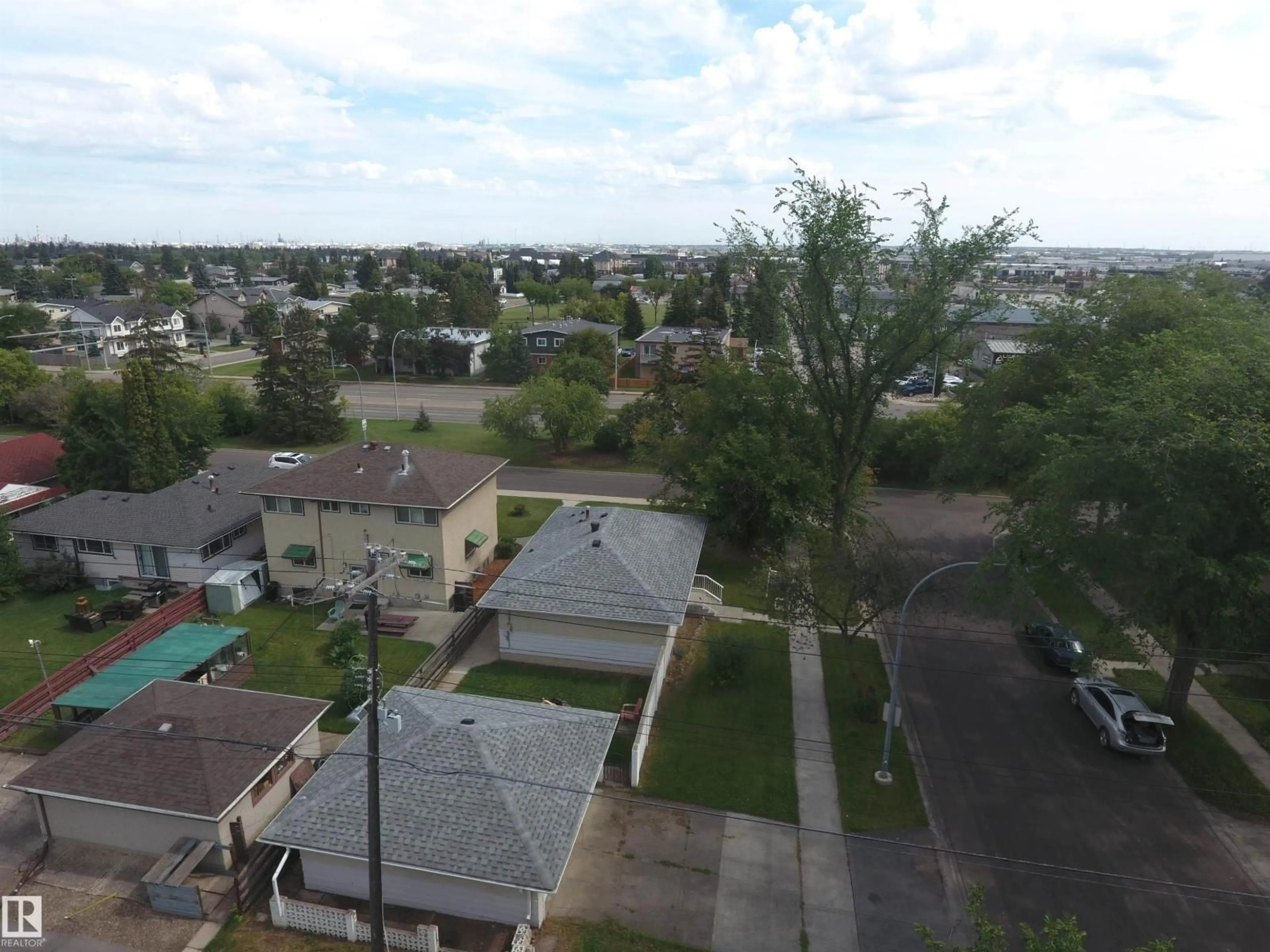 A pic from outside/outdoor area/front of a property/back of a property/a pic from drone, city buildings view from balcony for 7504 77 AV, Edmonton Alberta T6C0K5