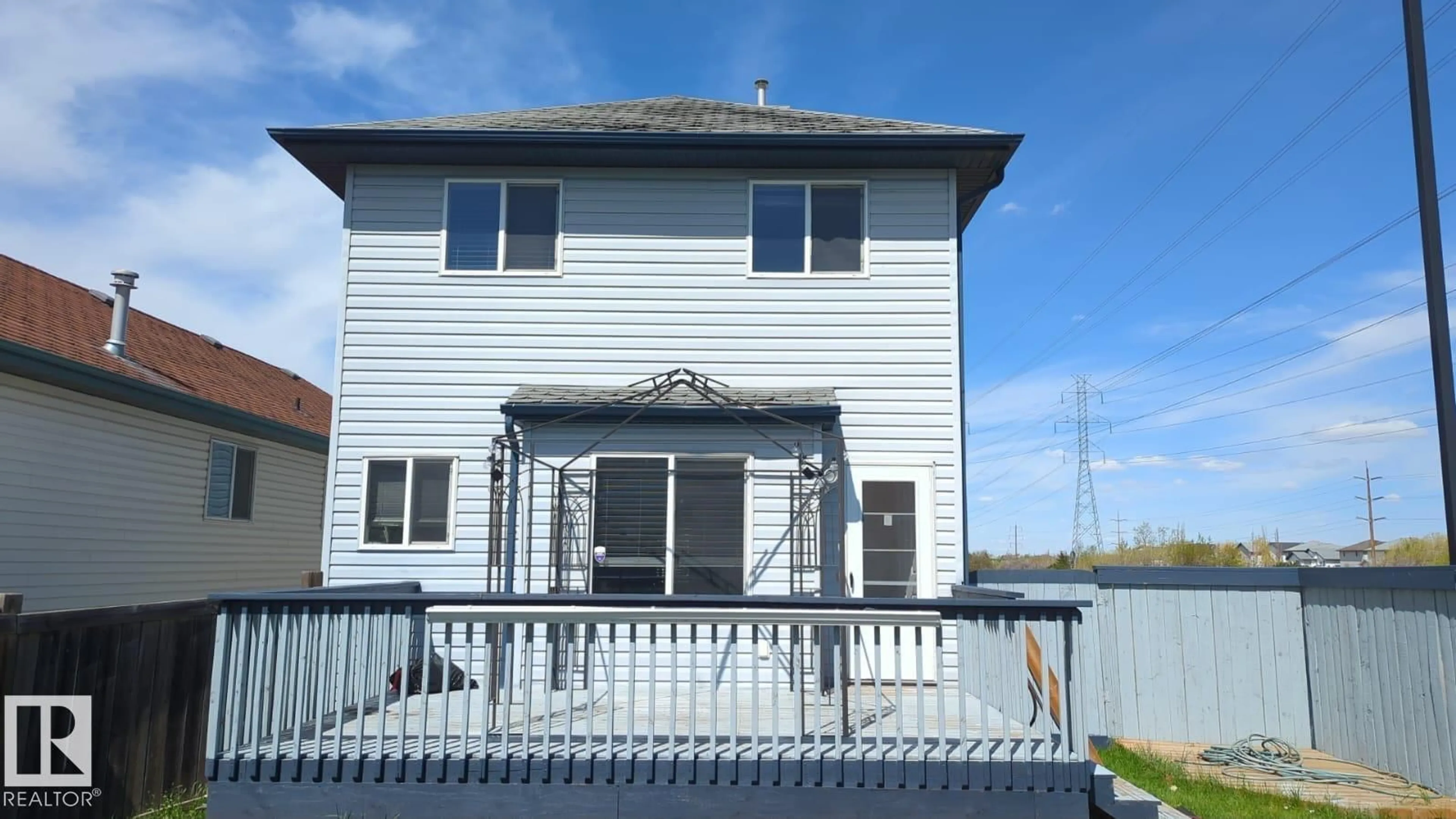 Home with vinyl exterior material, building for 3005 32 AV, Edmonton Alberta T6T1X1