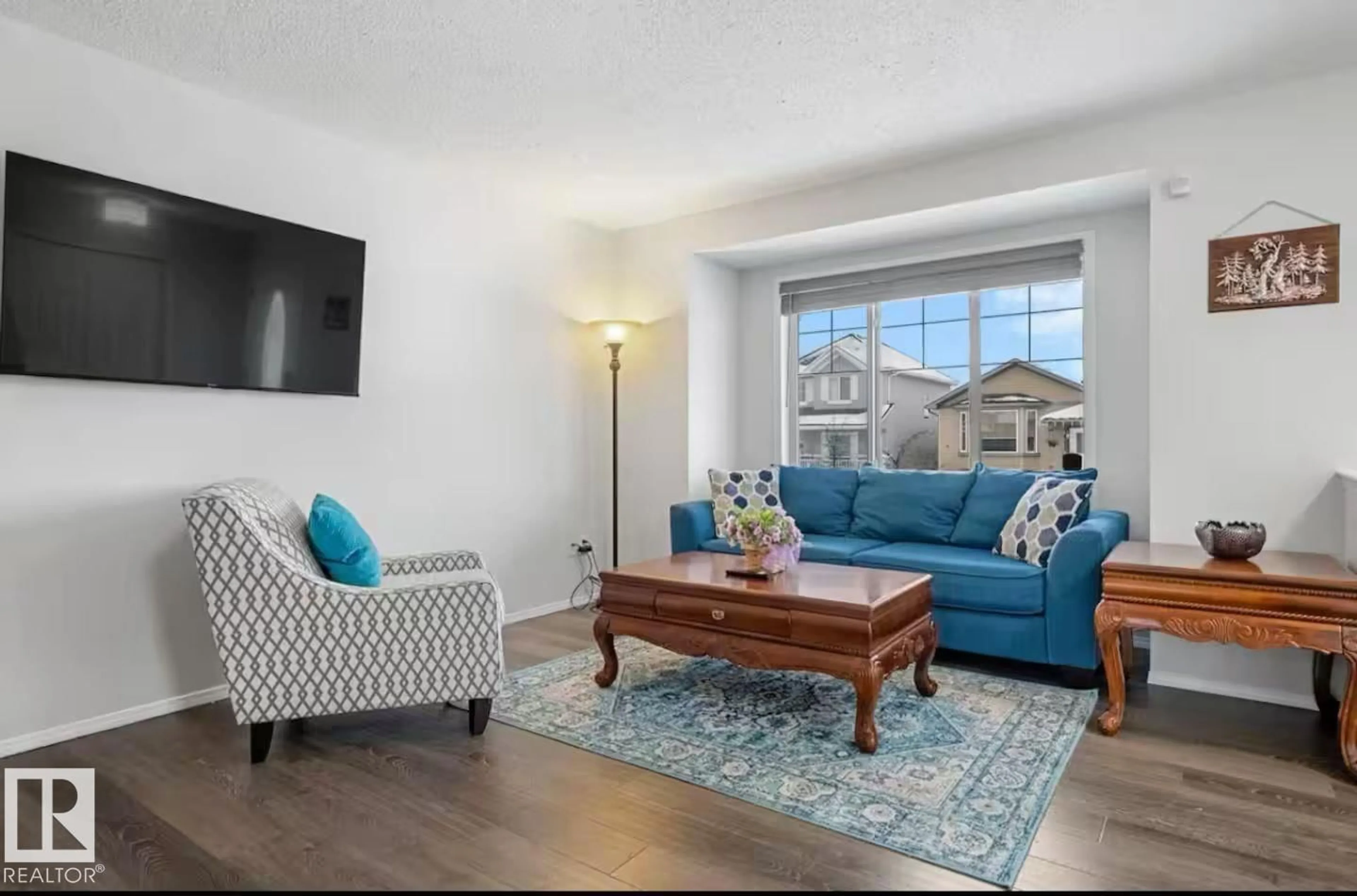 Living room with furniture, unknown for 3005 32 AV, Edmonton Alberta T6T1X1