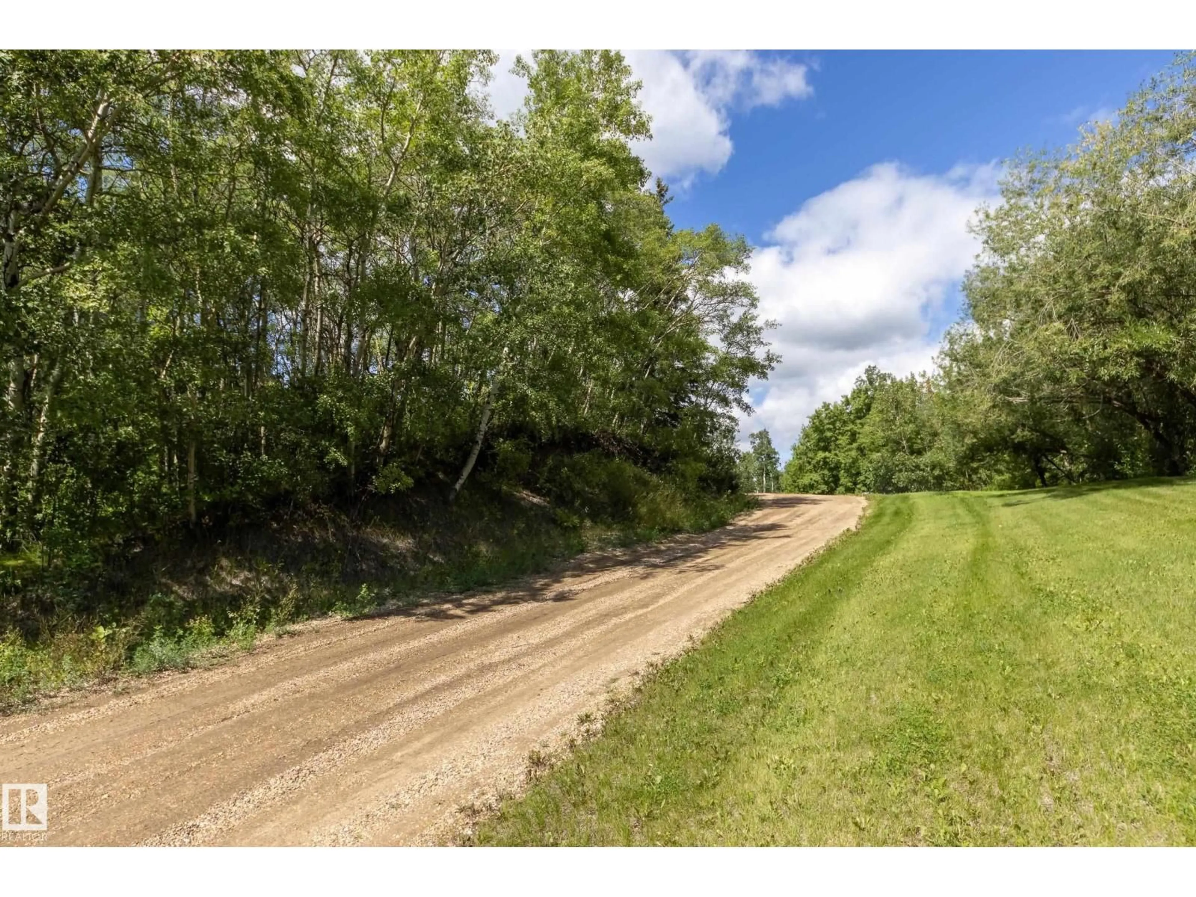 A pic from outside/outdoor area/front of a property/back of a property/a pic from drone, forest/trees view for 253 52152 RGE ROAD 225, Rural Strathcona County Alberta T8C1C6