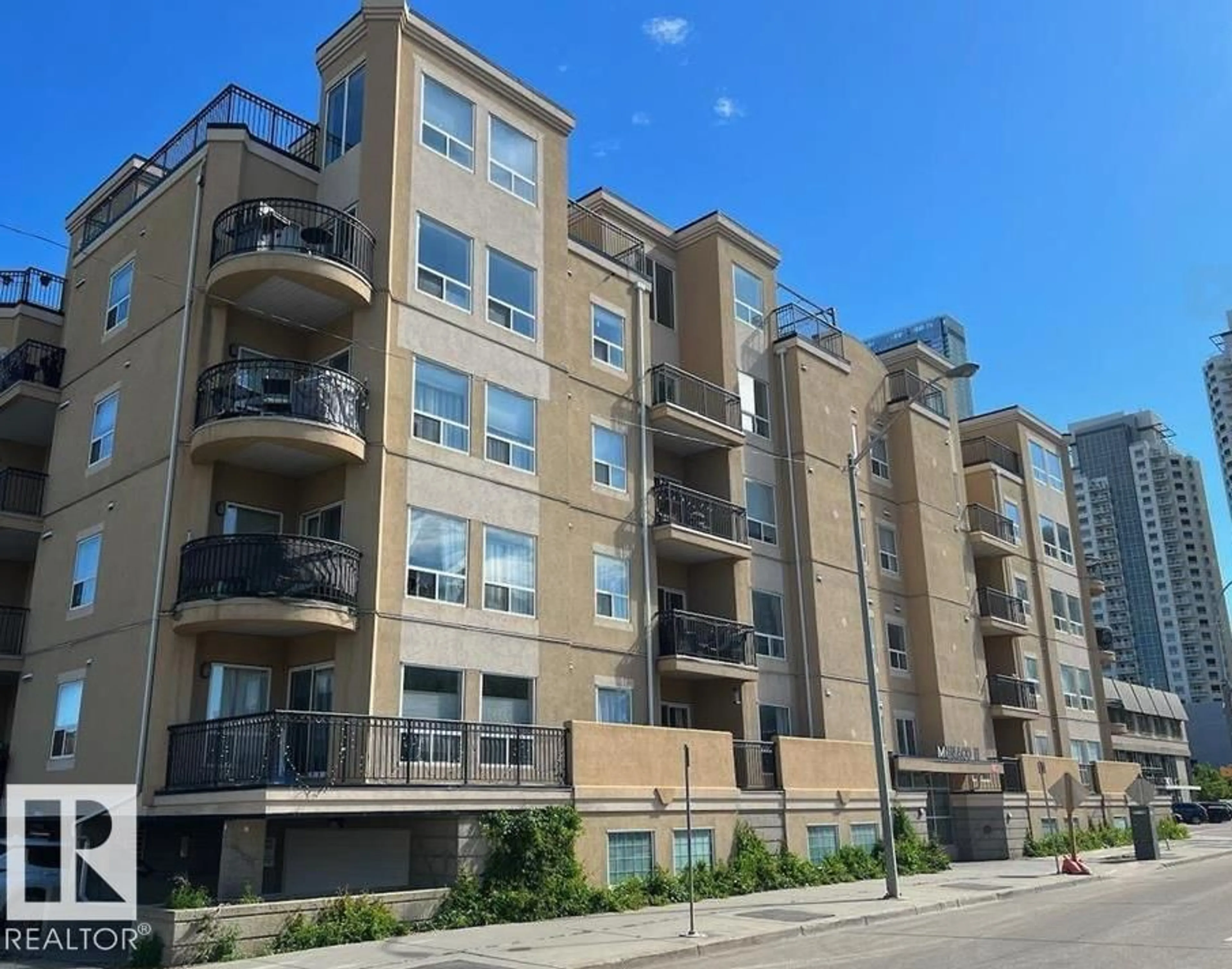 A pic from outside/outdoor area/front of a property/back of a property/a pic from drone, unknown for 310 - 10606 102 AV, Edmonton Alberta T5J5E9