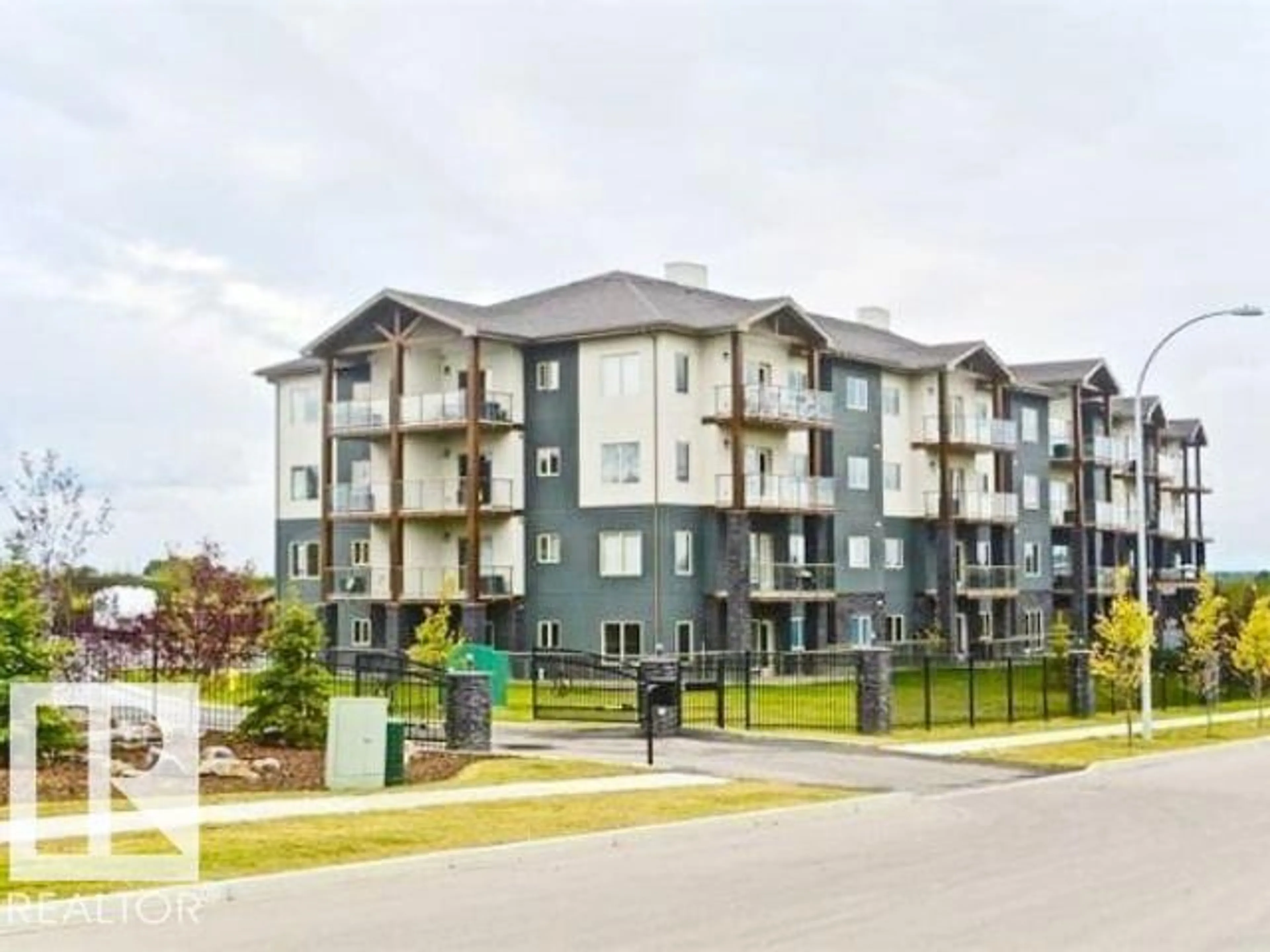 A pic from outside/outdoor area/front of a property/back of a property/a pic from drone, unknown for #408 - 5201 BROUGHAM DR, Drayton Valley Alberta T7A0A1