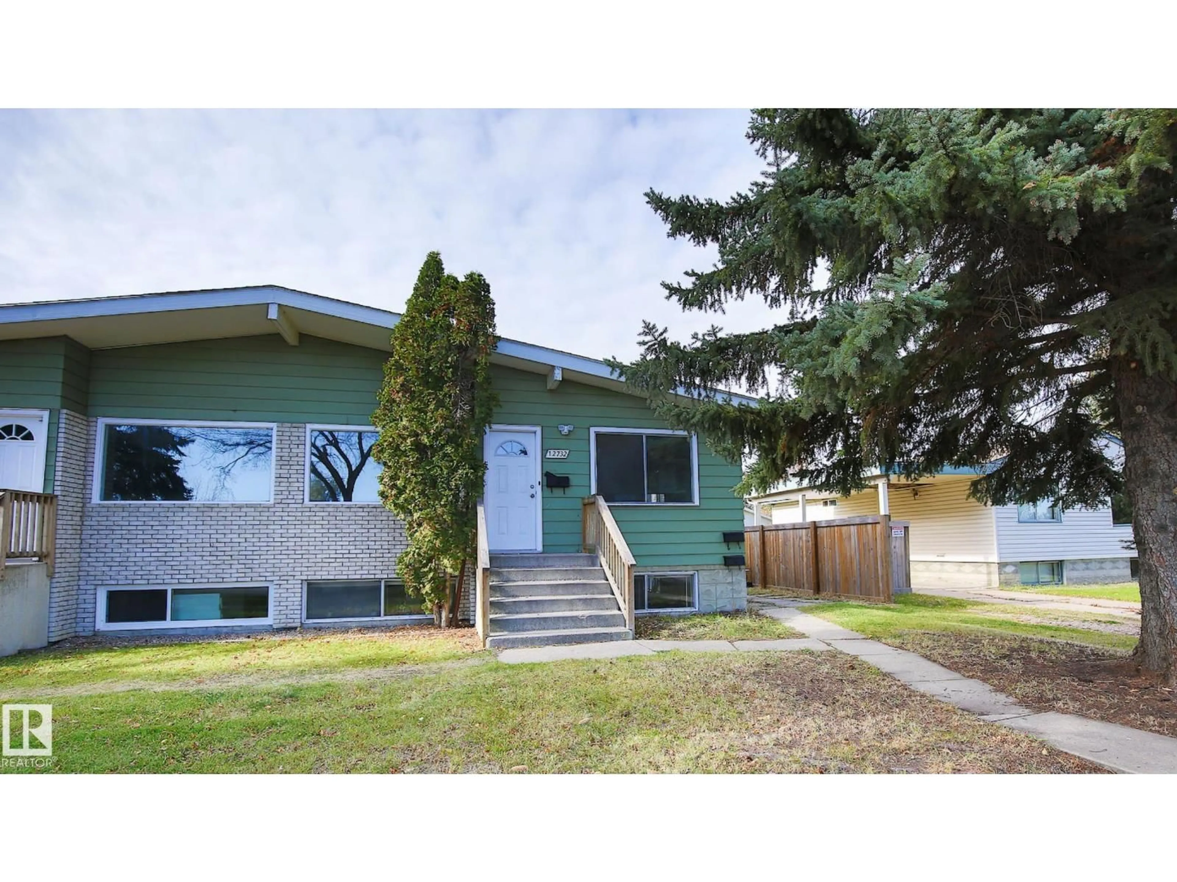 Home with vinyl exterior material, street for NW - 12732 113A ST, Edmonton Alberta T5E5B3