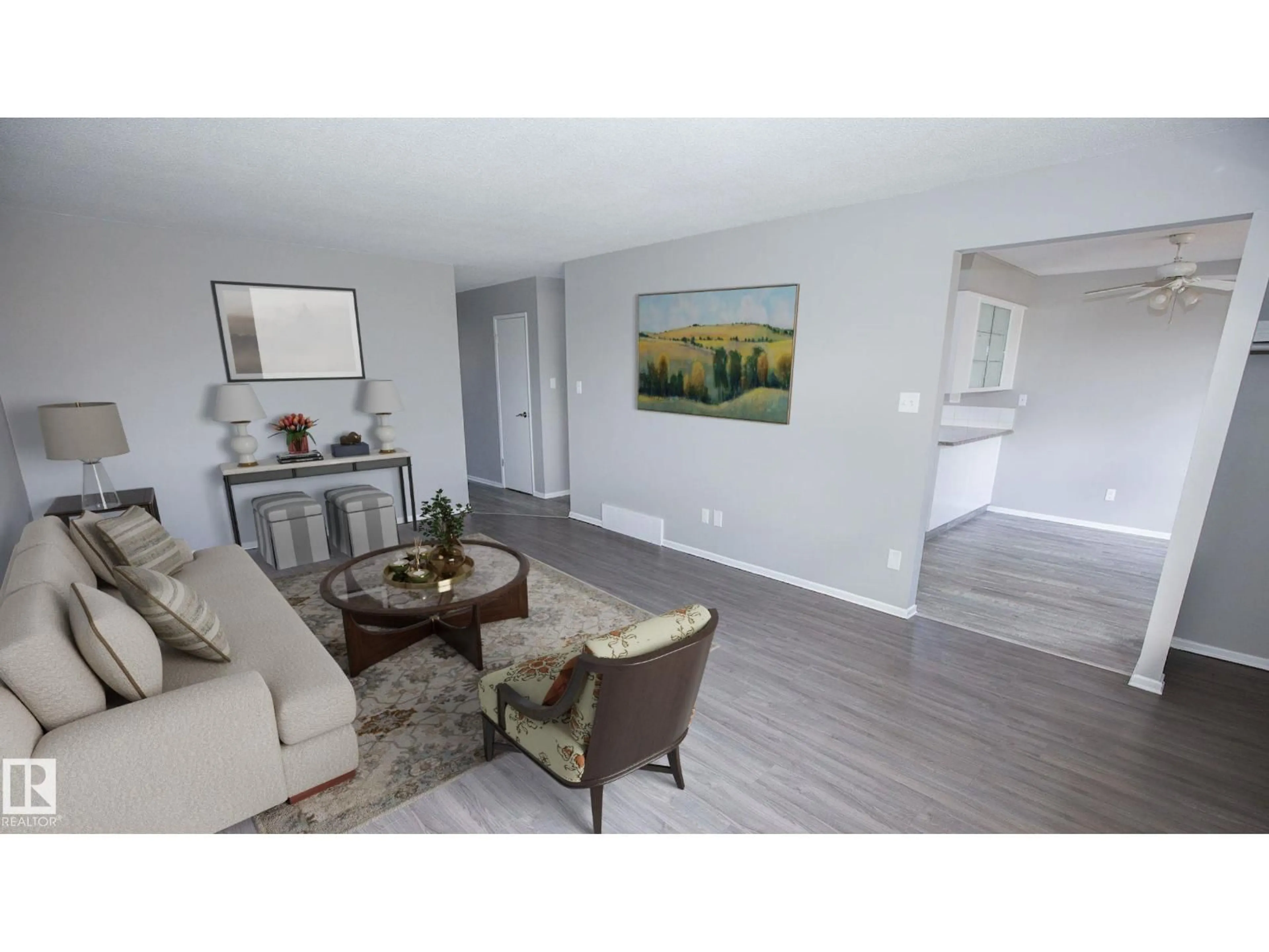 Living room with furniture, wood/laminate floor for NW - 12732 113A ST, Edmonton Alberta T5E5B3