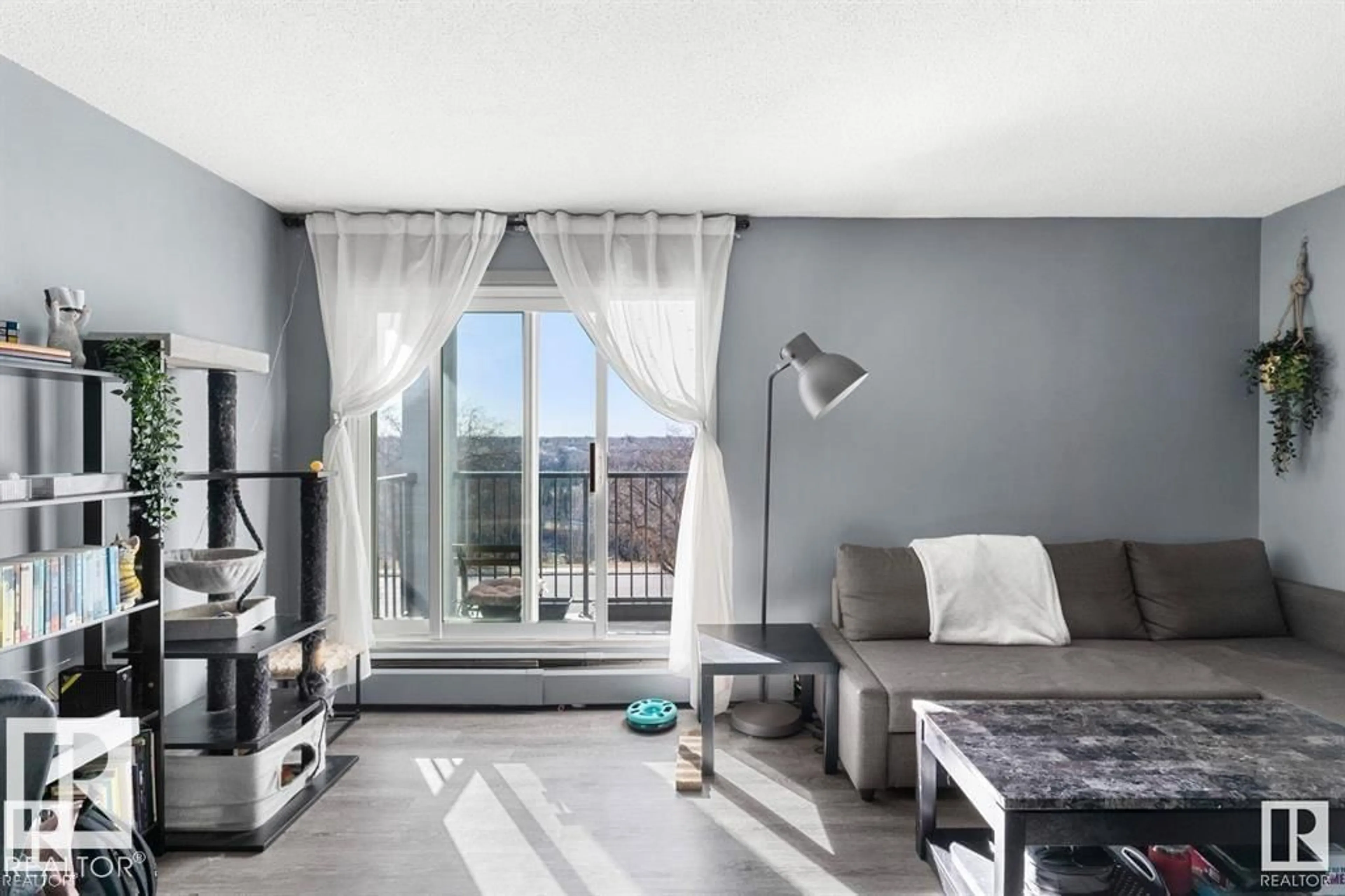 Living room with furniture, unknown for #306 - 8310 JASPER AV, Edmonton Alberta T5H3S3