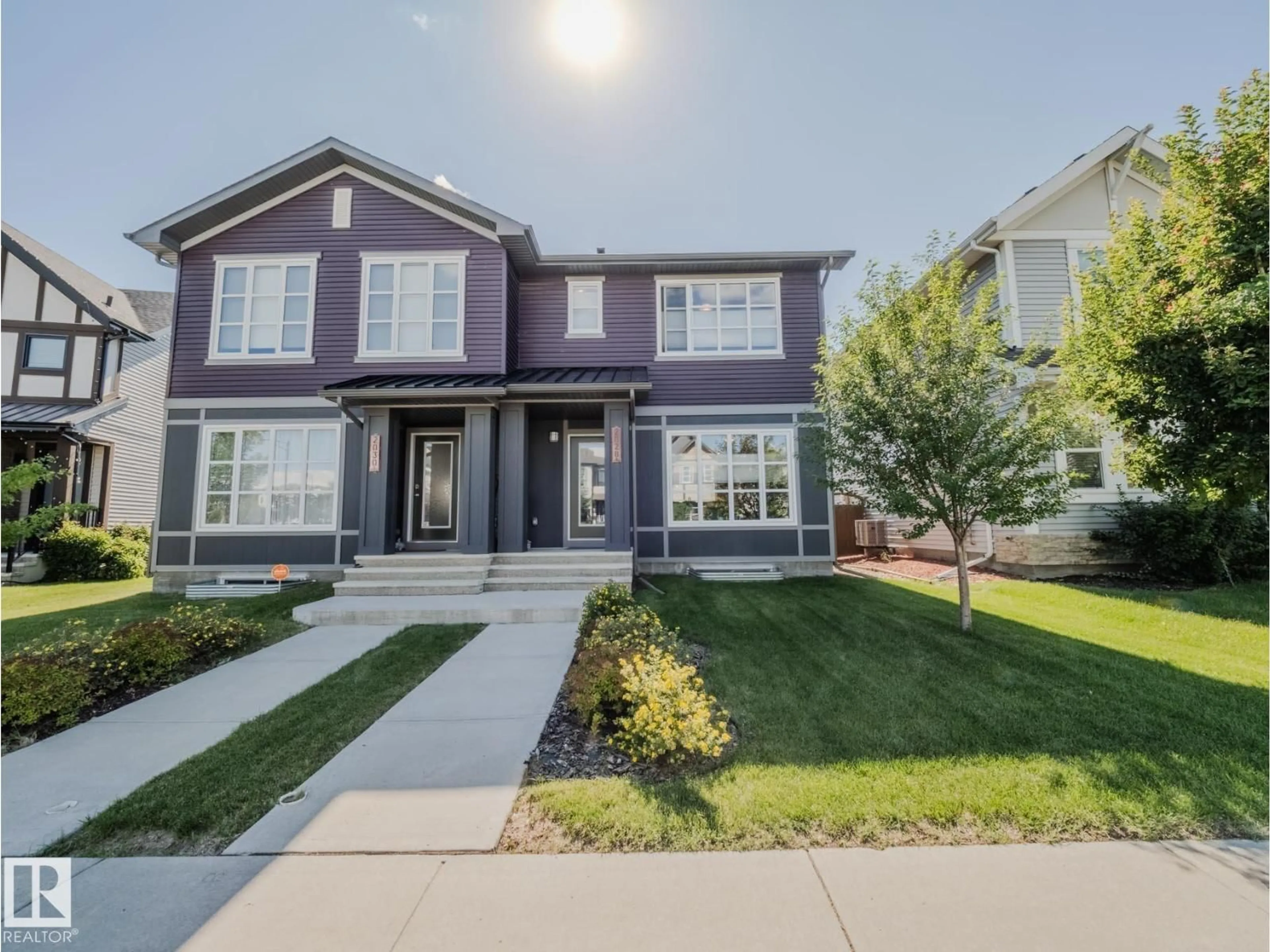 Home with vinyl exterior material, street for 2028 CAVANAGH DR, Edmonton Alberta T6W3M7