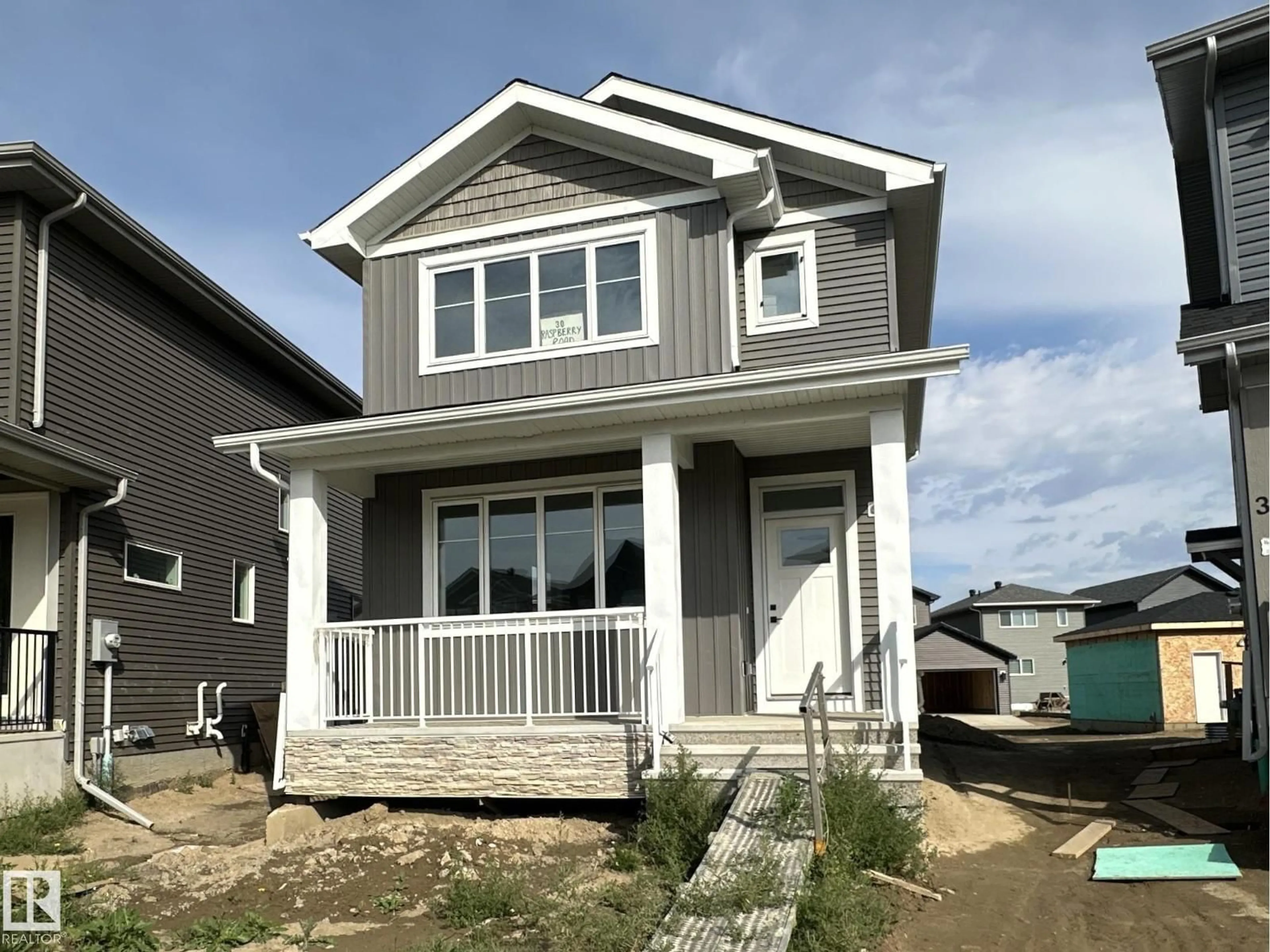 Home with vinyl exterior material, street for 30 RASPBERRY RD, St. Albert Alberta T8N8A3