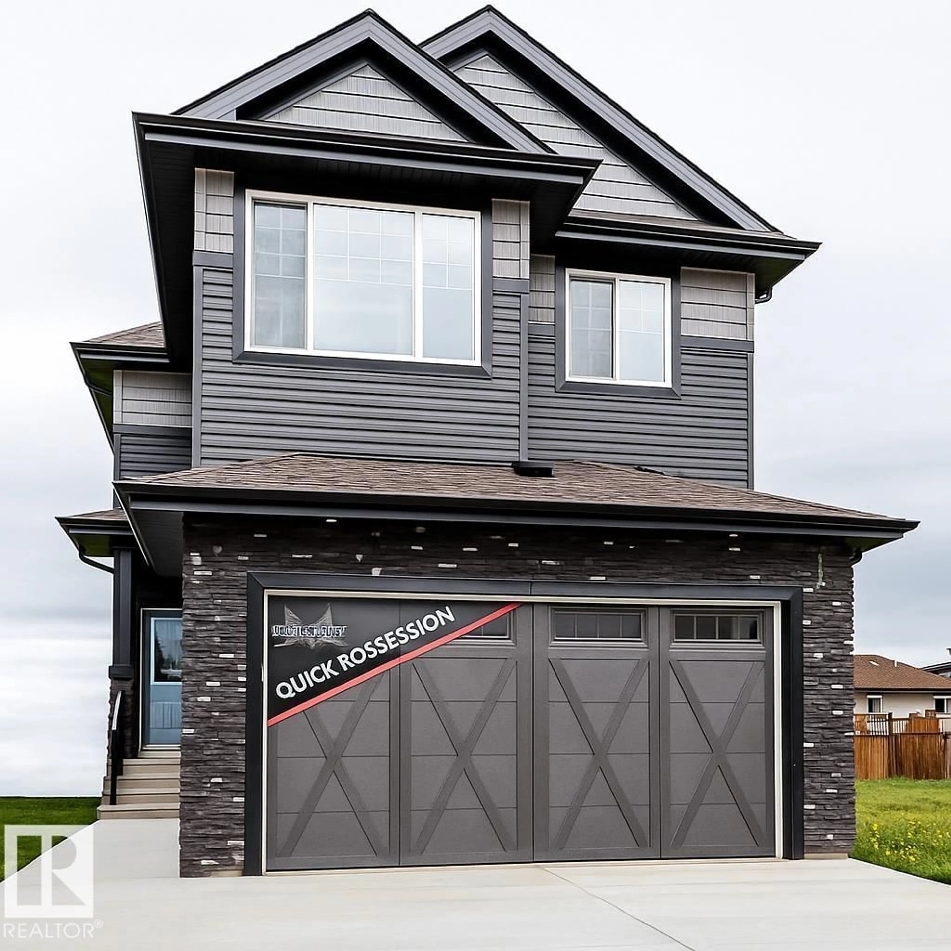 Home with brick exterior material, street for 82 SILVERSTONE DR, Stony Plain Alberta T7Z0E8