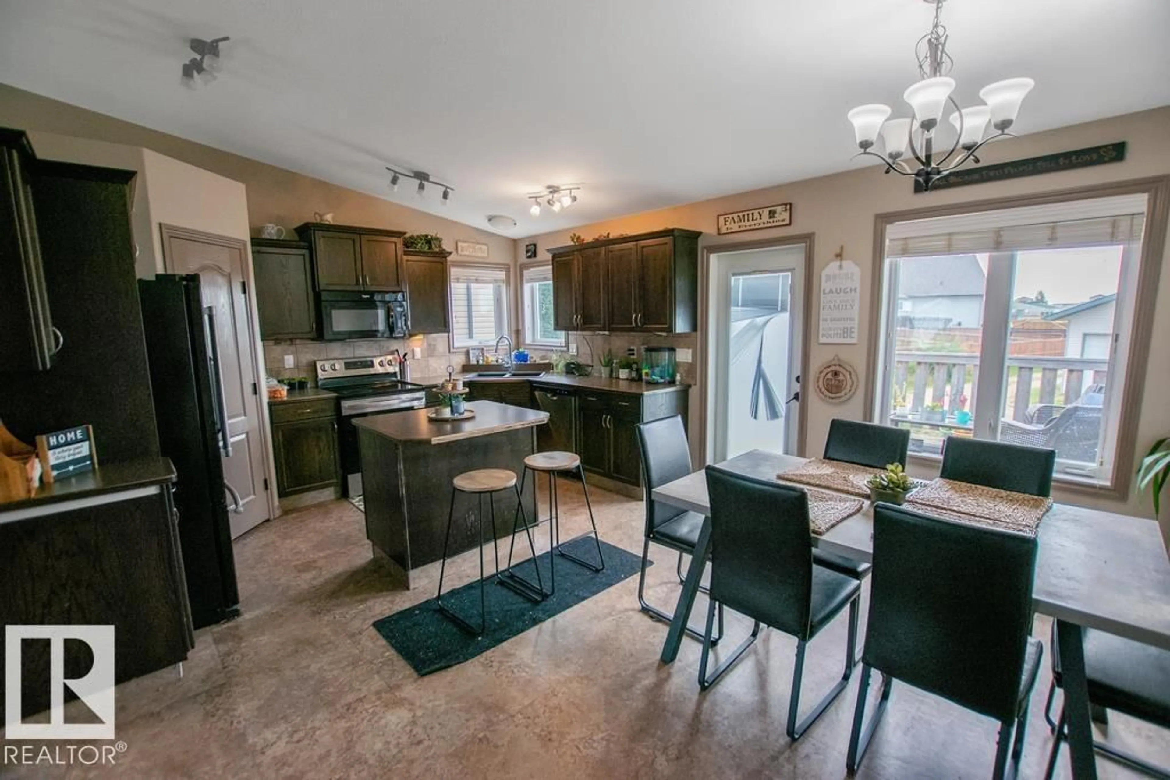 Open concept kitchen, ceramic/tile floor for 3814 45 AV, Bonnyville Town Alberta T9N0A9