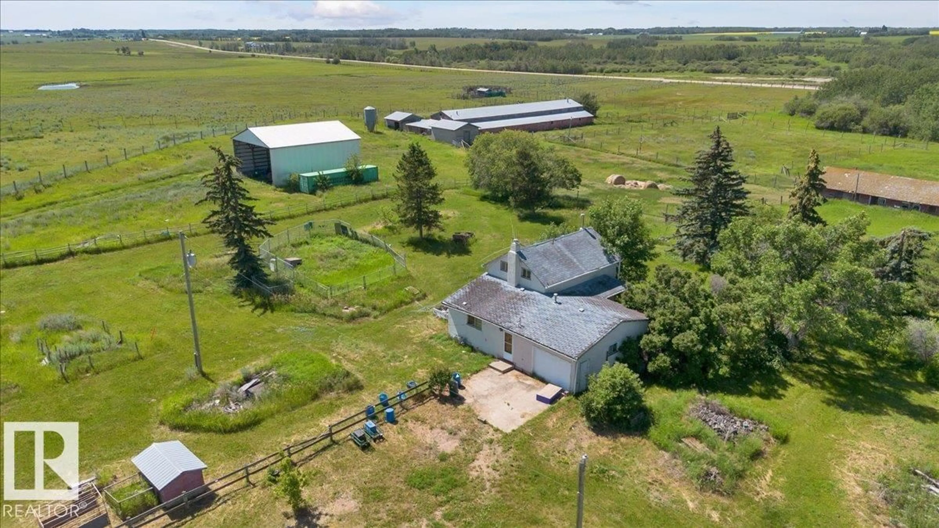 A pic from outside/outdoor area/front of a property/back of a property/a pic from drone, building for 23427 TWP RD 574, Rural Sturgeon County Alberta T8R1L2