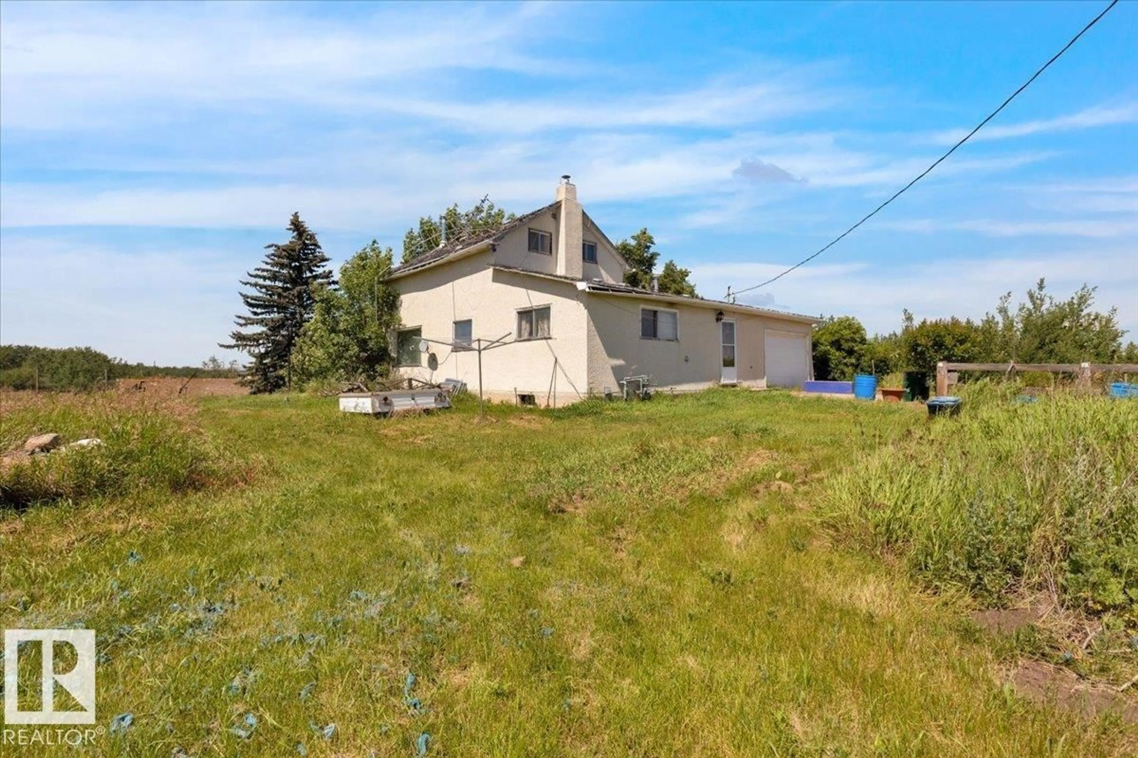 A pic from outside/outdoor area/front of a property/back of a property/a pic from drone, unknown for 23427 TWP RD 574, Rural Sturgeon County Alberta T8R1L2