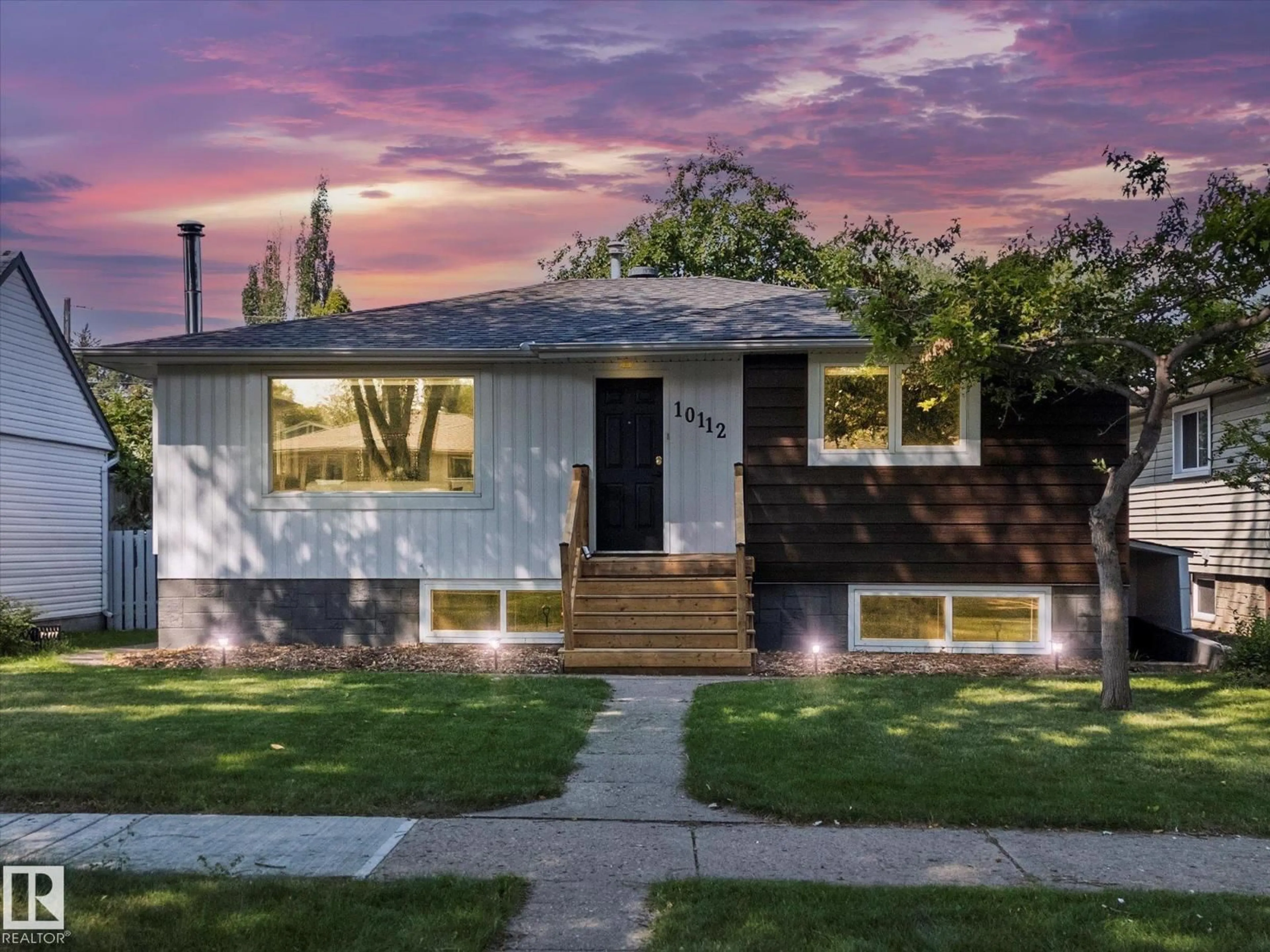 Home with vinyl exterior material, street for 10112 81 ST, Edmonton Alberta T6A3K5