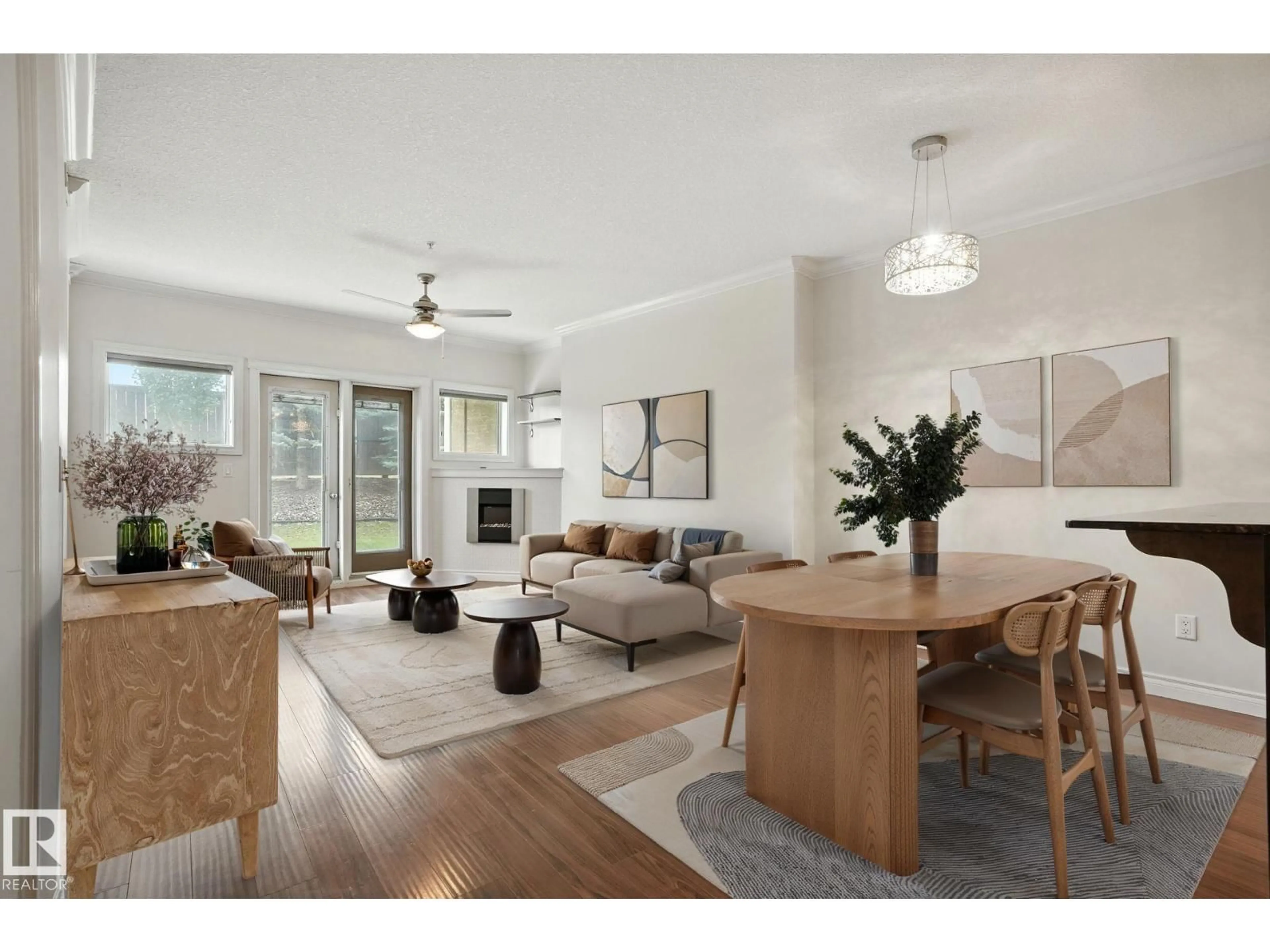 Living room with furniture, wood/laminate floor for #146 - 10121 80 AV, Edmonton Alberta T6E0B9