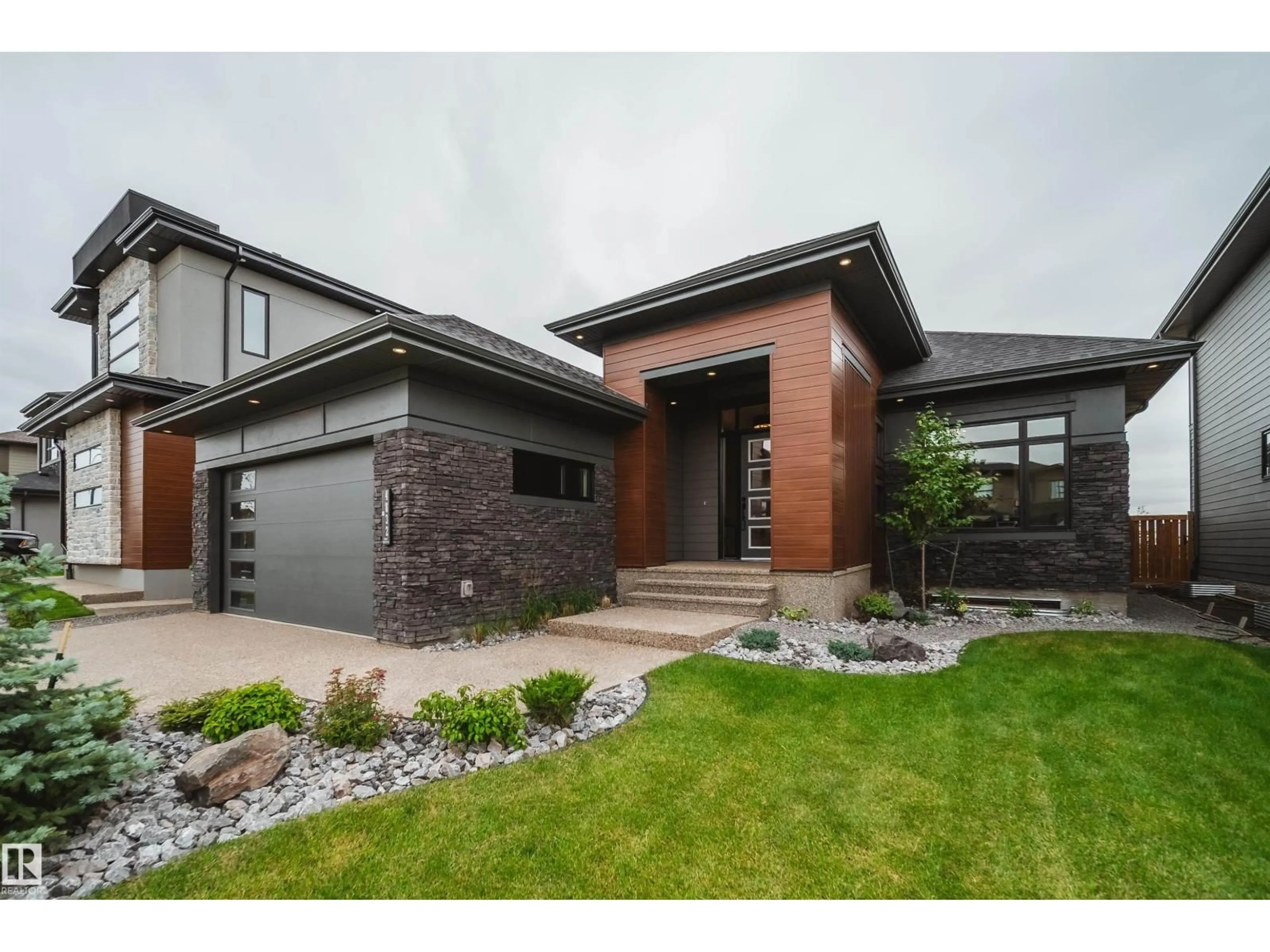 Home with brick exterior material, street for 4832 KNIGHT CR, Edmonton Alberta T6W5A2