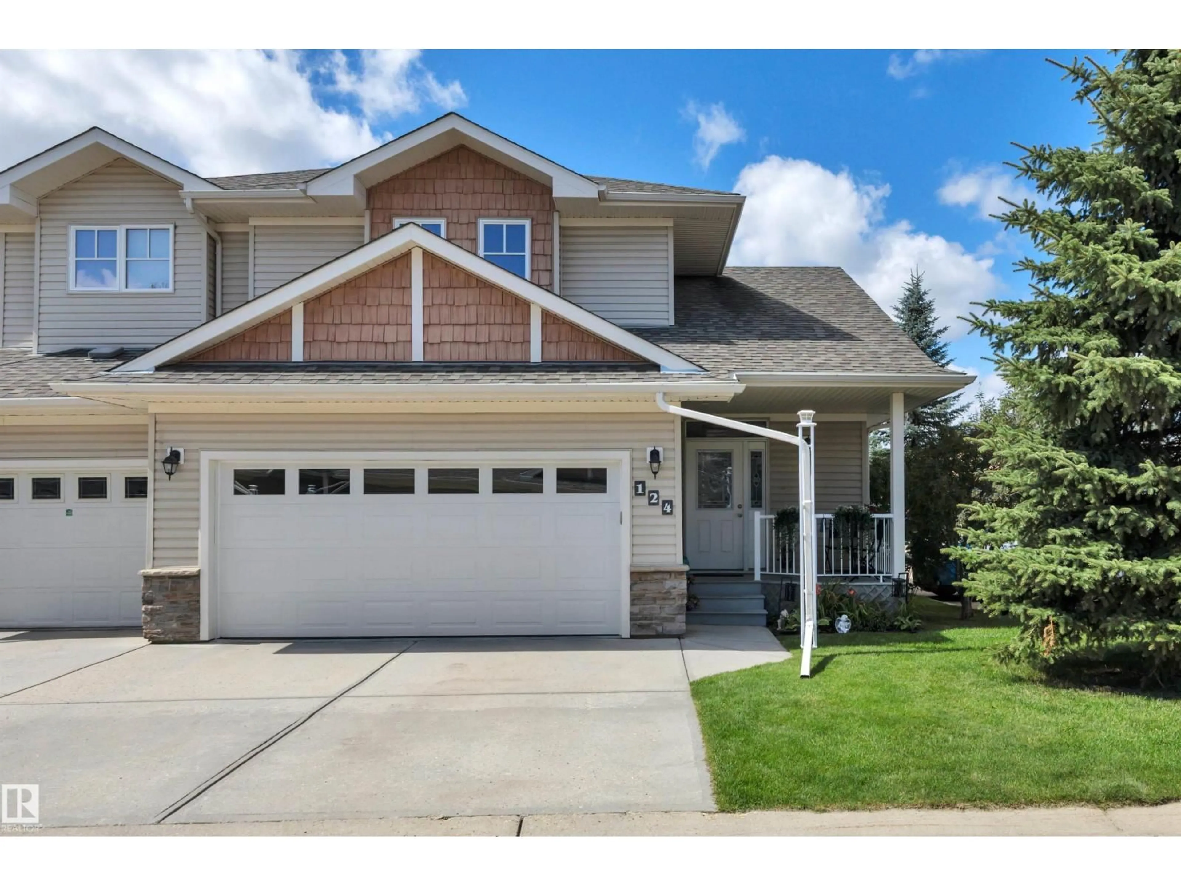 Home with vinyl exterior material, street for 102 - 124 WEST HAVEN DR, Leduc Alberta T9E0A2
