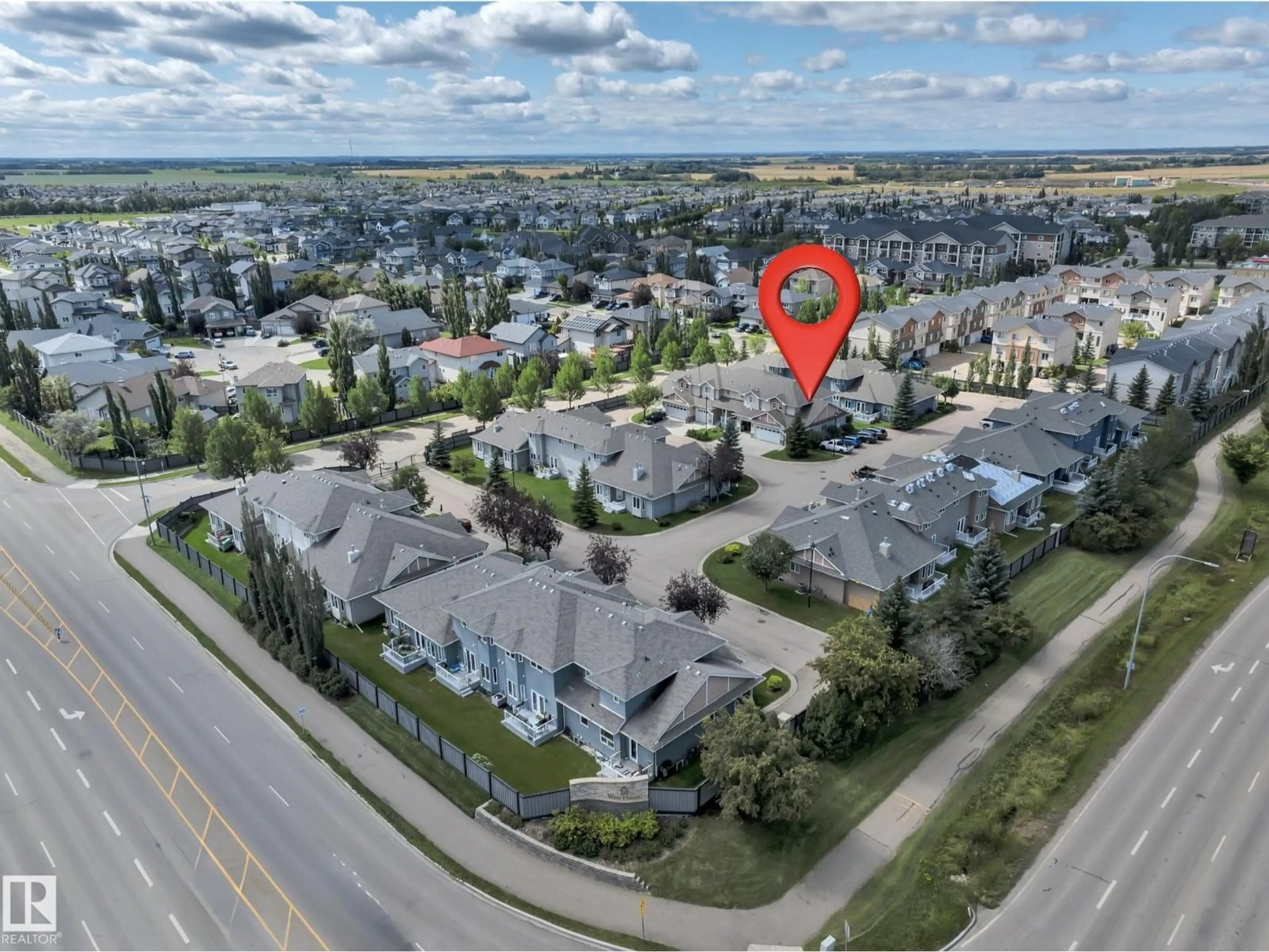 A pic from outside/outdoor area/front of a property/back of a property/a pic from drone, street for 102 - 124 WEST HAVEN DR, Leduc Alberta T9E0A2
