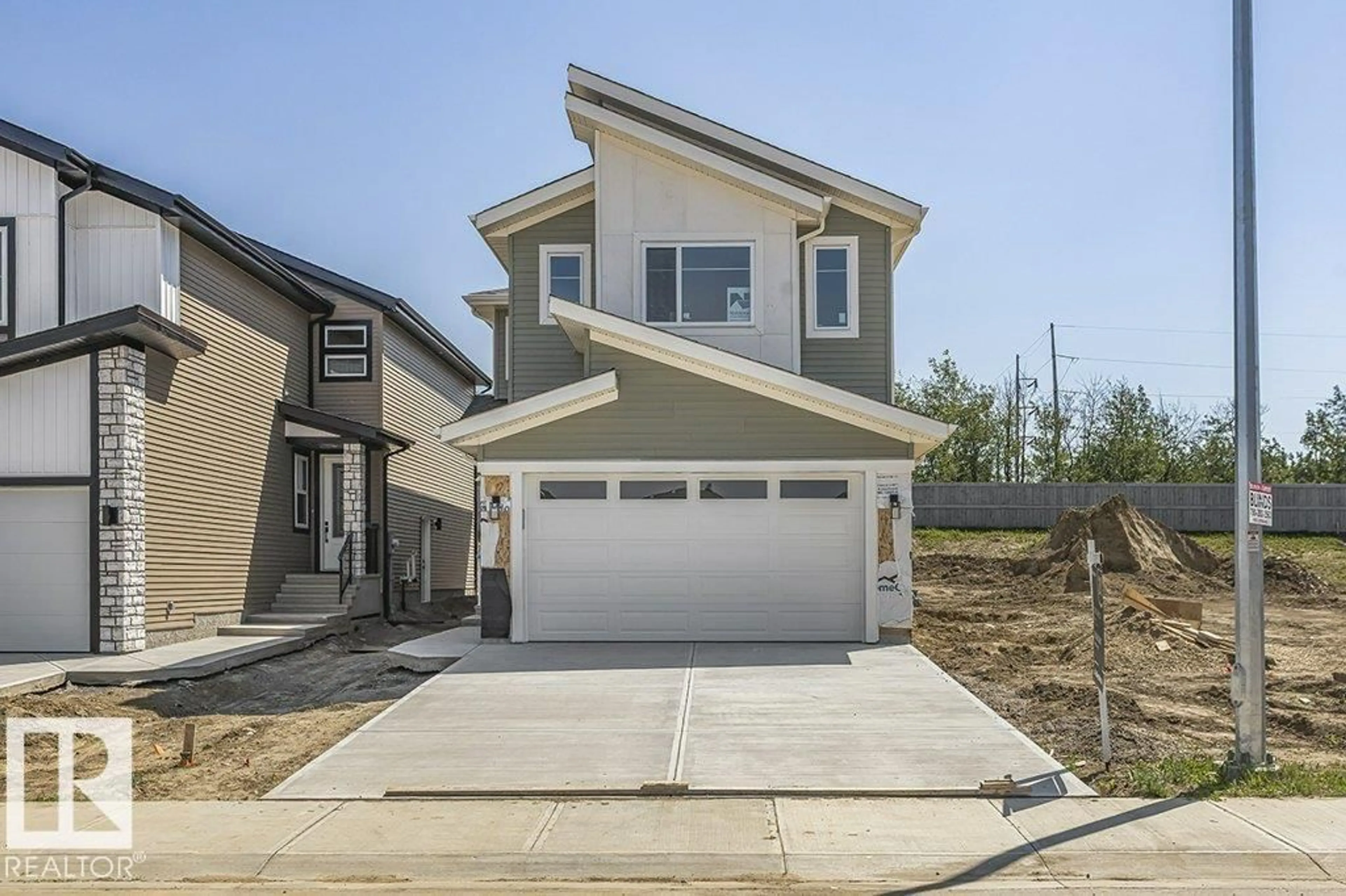 Home with vinyl exterior material, street for 63 SILVERSTONE DR, Stony Plain Alberta T7Y0E8