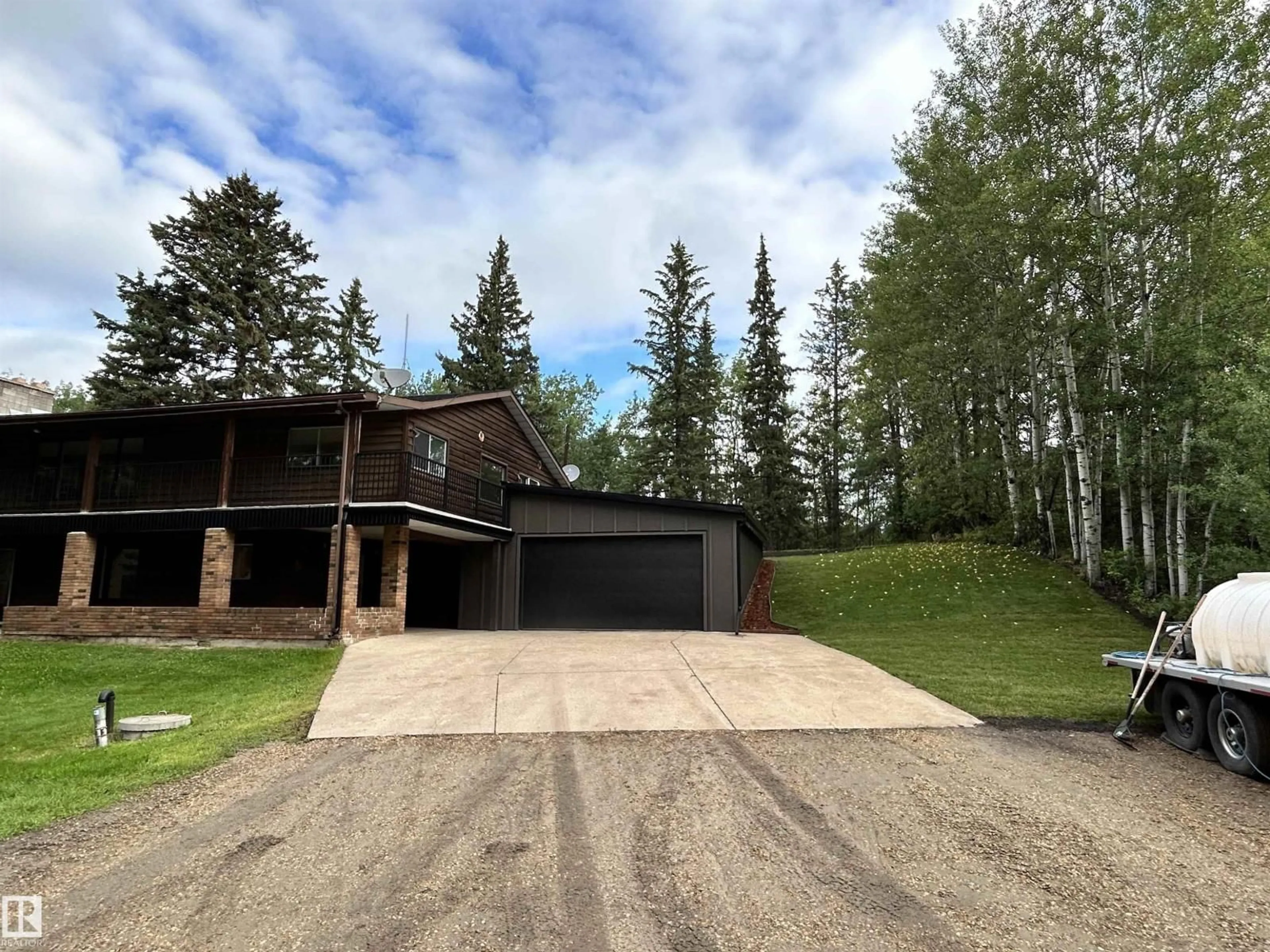 A pic from outside/outdoor area/front of a property/back of a property/a pic from drone, unknown for 22430 - 133 TWP ROAD 520, Rural Strathcona County Alberta T8C1E6