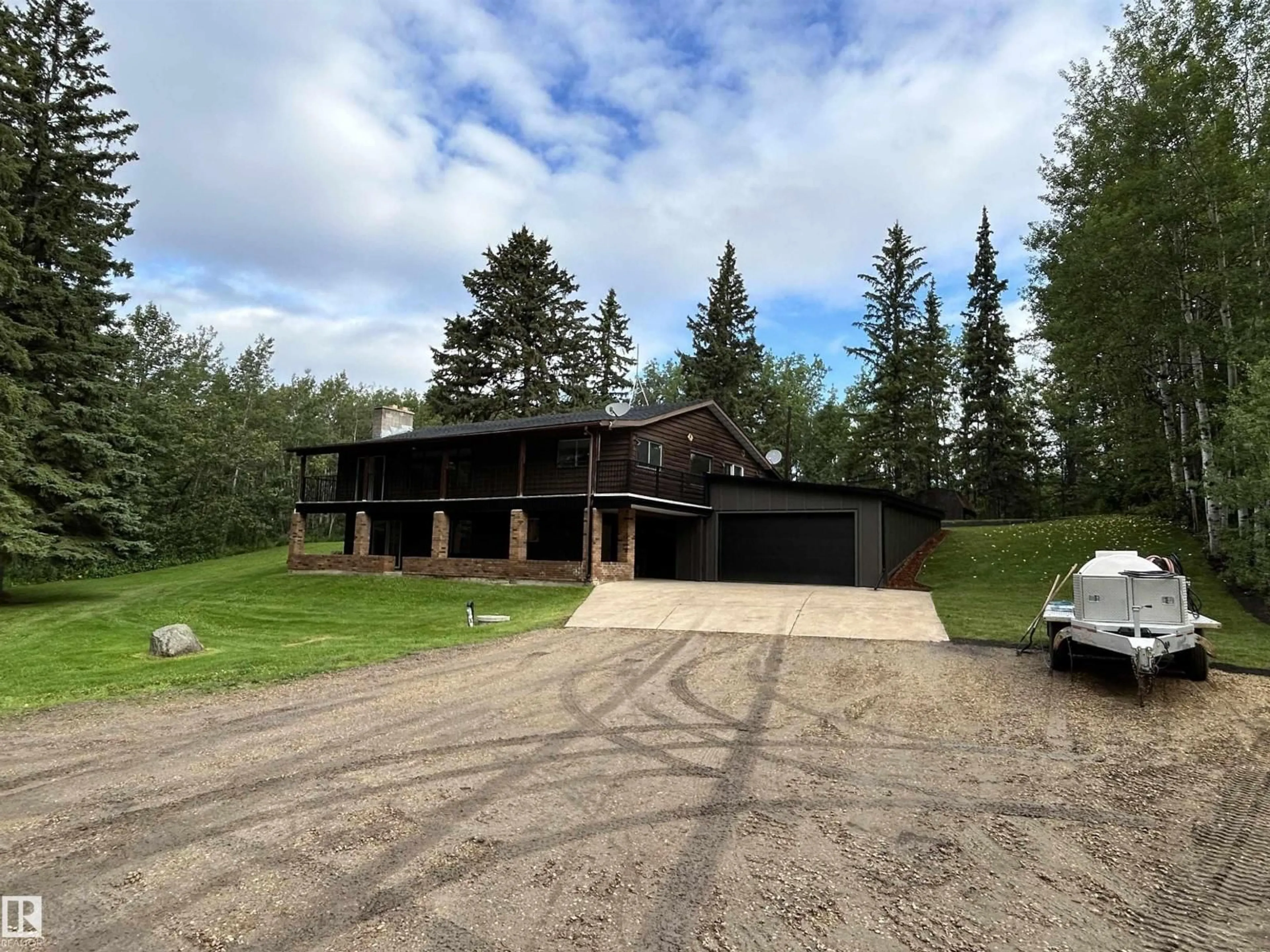 A pic from outside/outdoor area/front of a property/back of a property/a pic from drone, building for 22430 - 133 TWP ROAD 520, Rural Strathcona County Alberta T8C1E6