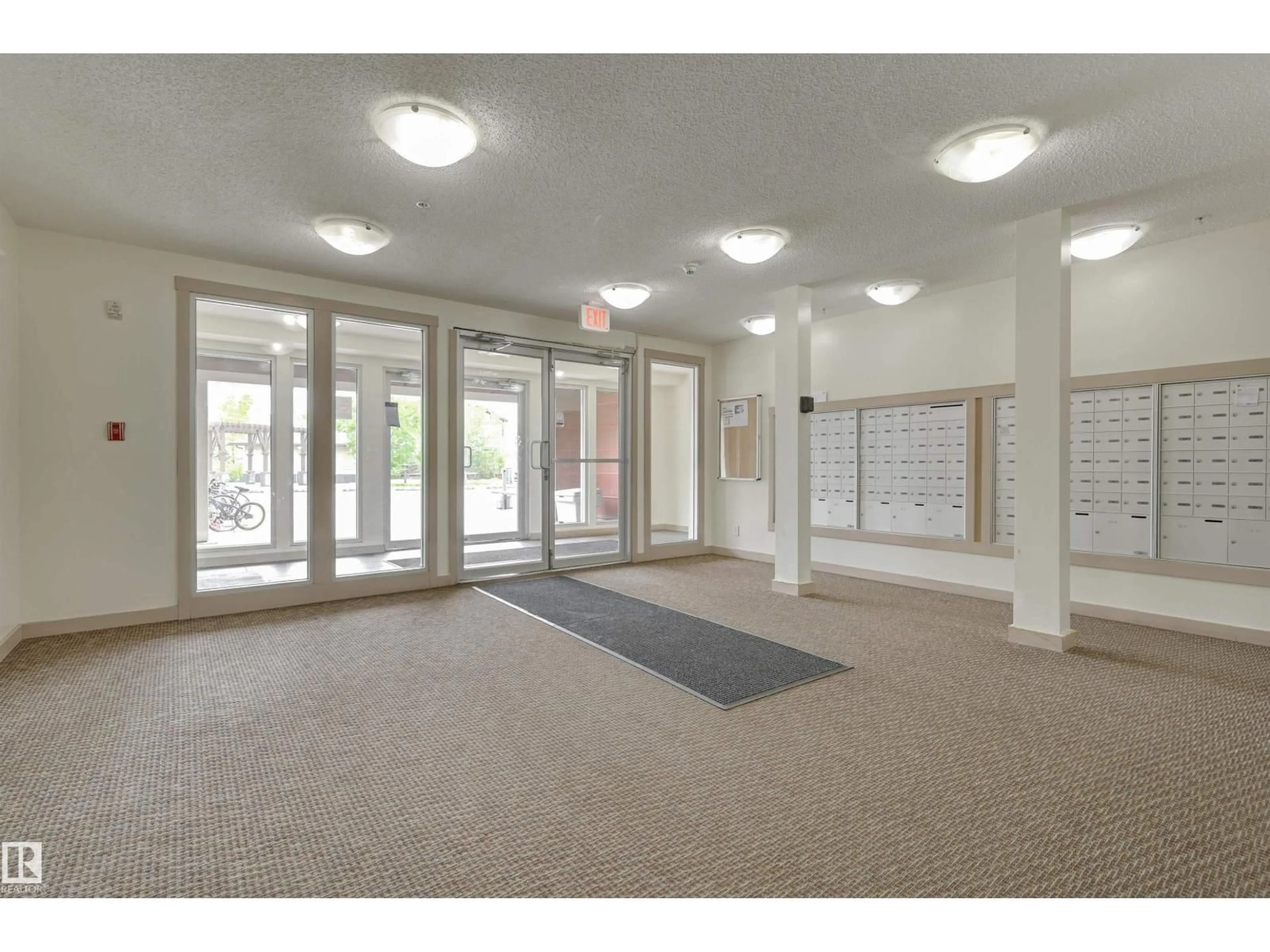 Indoor foyer for #422 - 3315 JAMES MOWATT TR, Edmonton Alberta T6W3L9