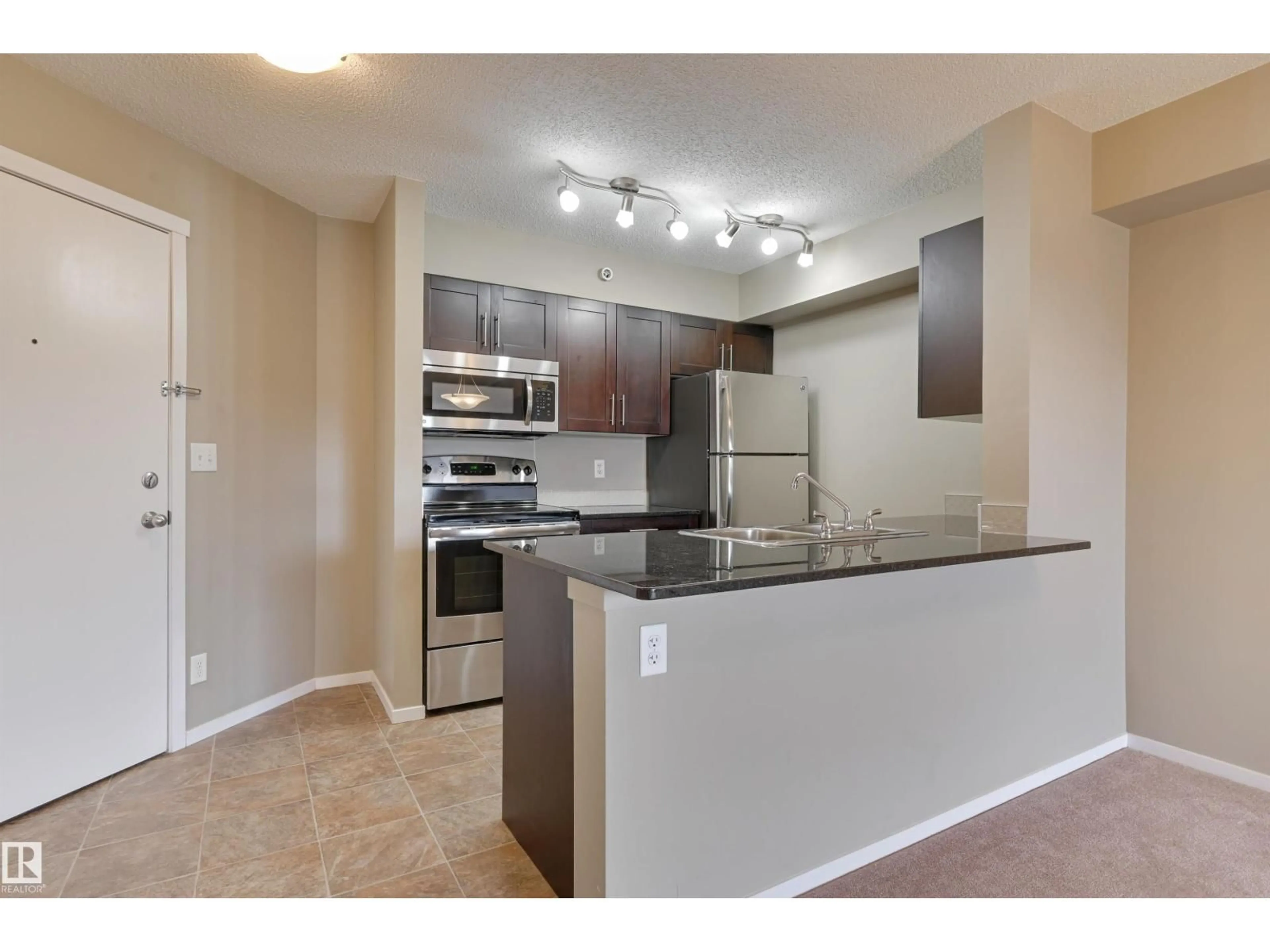 Standard kitchen, unknown for #422 - 3315 JAMES MOWATT TR, Edmonton Alberta T6W3L9