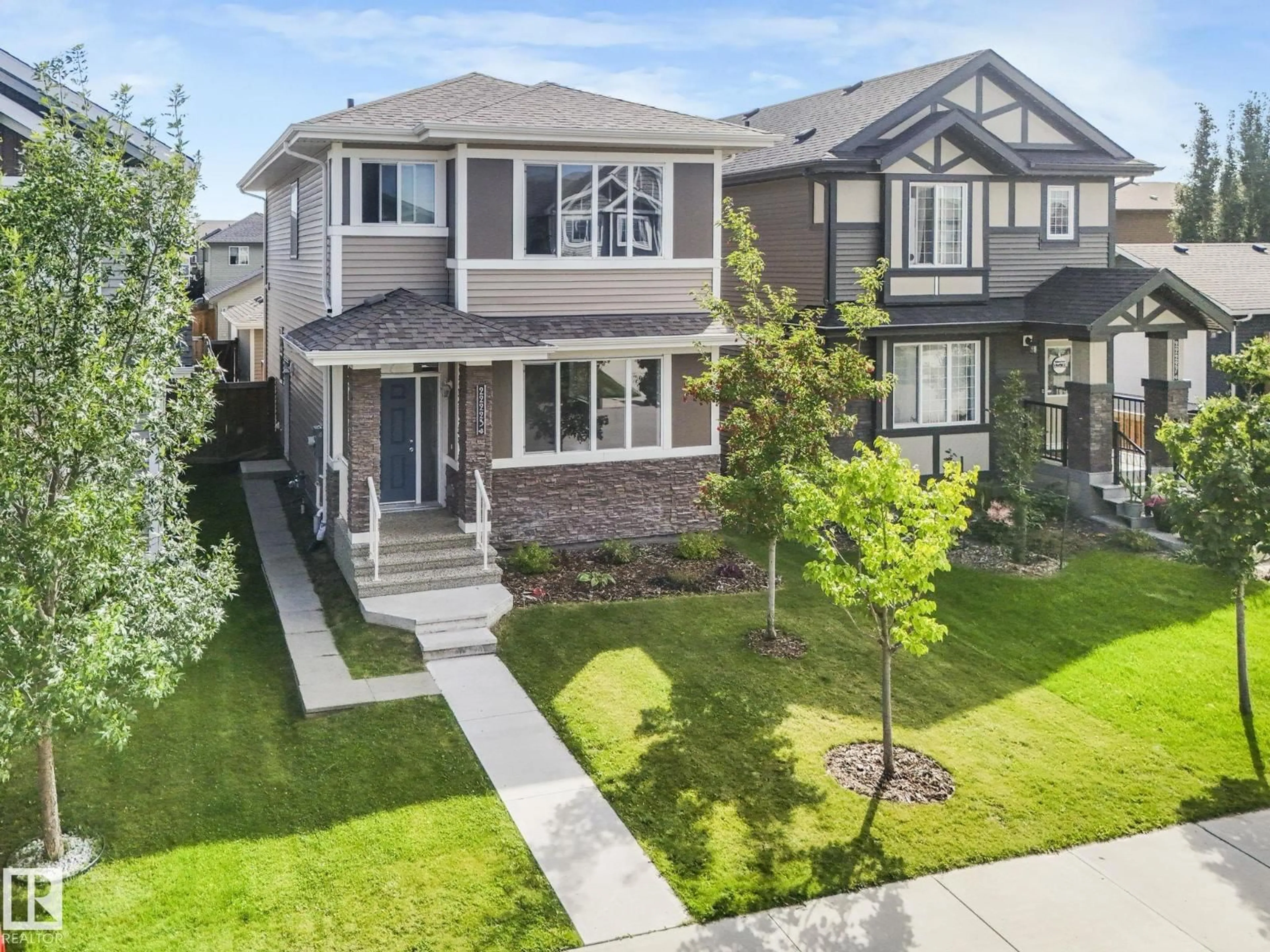 Home with brick exterior material, street for NW - 22223 89 AV, Edmonton Alberta T5T7H1