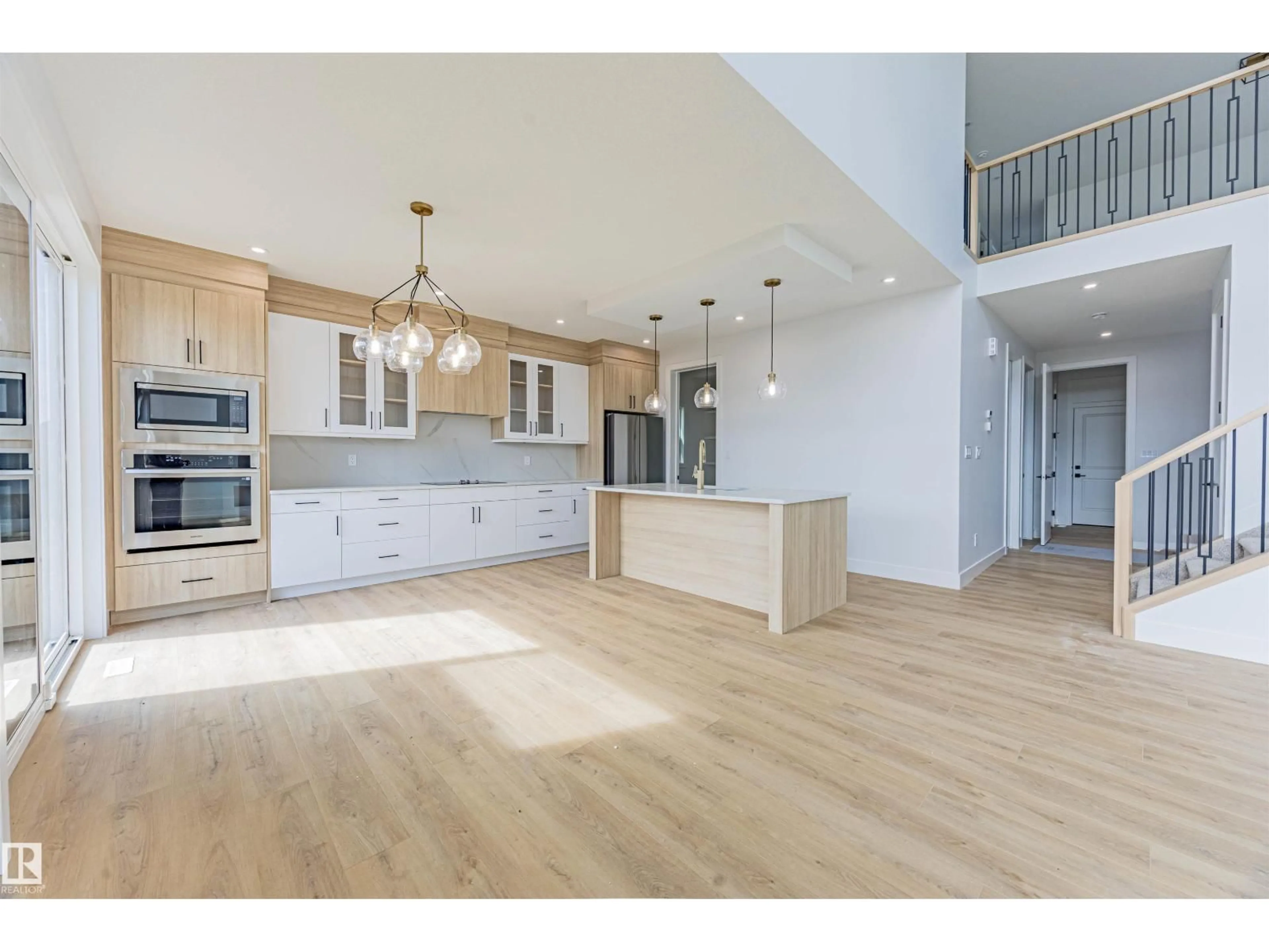 Open concept kitchen, wood/laminate floor for 25 BIRKSHIRE CR, Sherwood Park Alberta T8B0C6