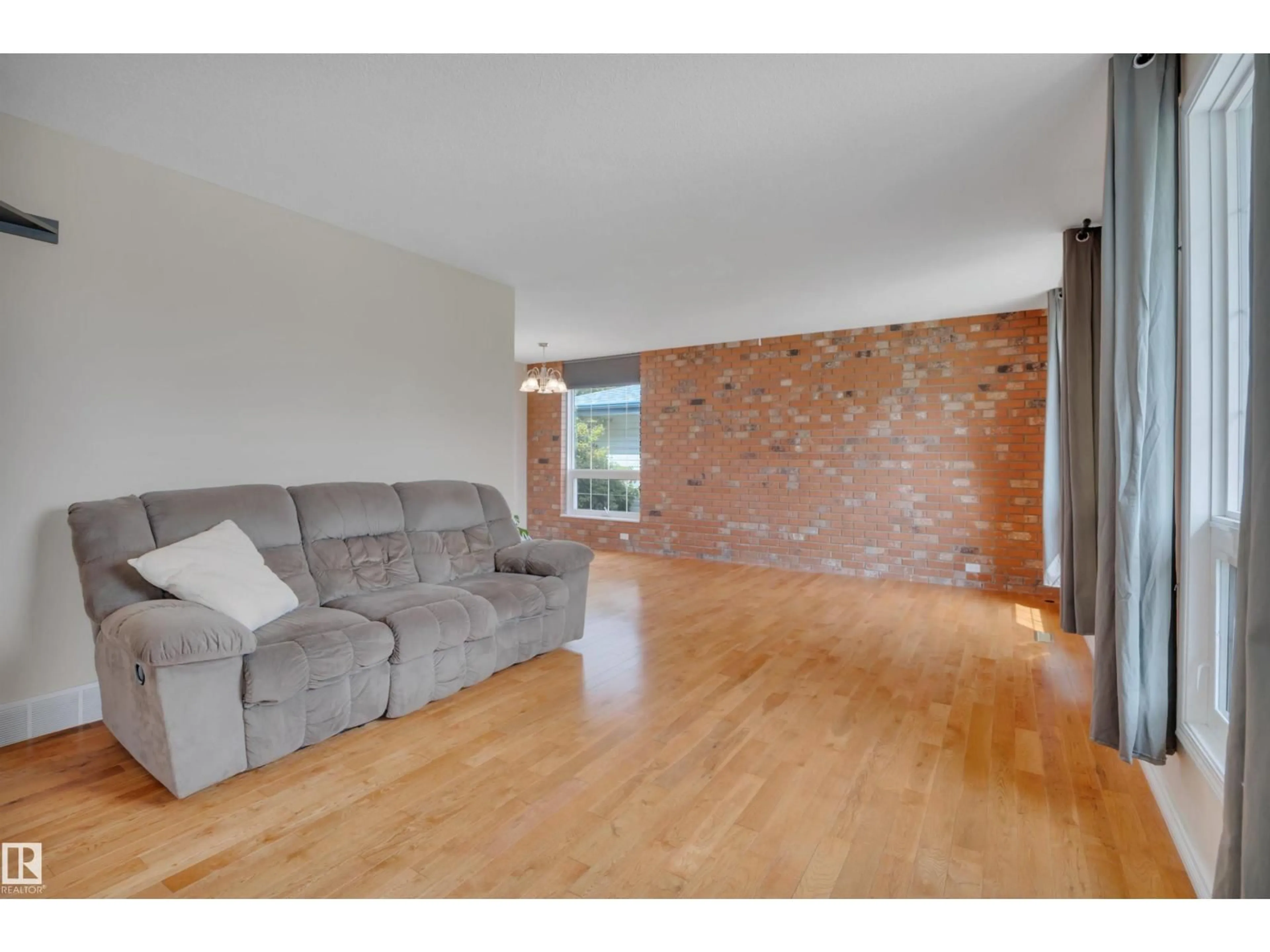 Living room with furniture, unknown for 3624 107 ST, Edmonton Alberta T6J1B1