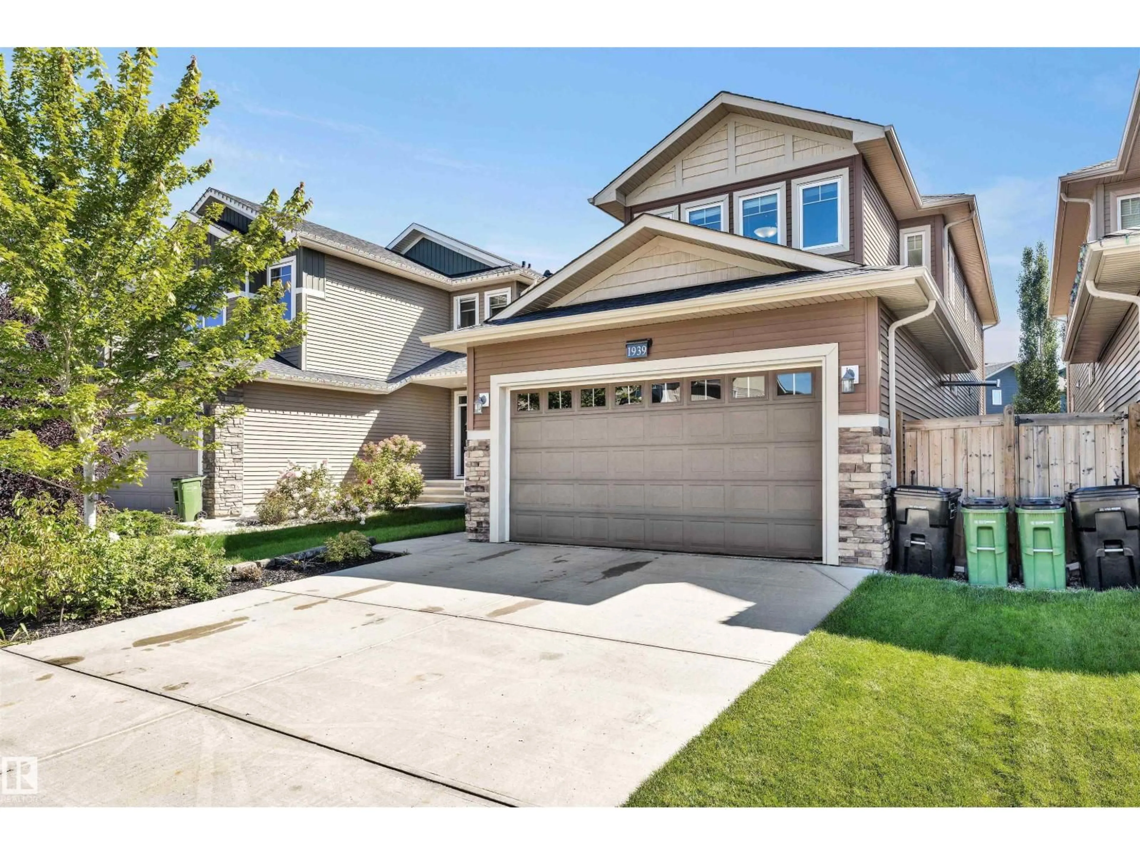 Home with vinyl exterior material, street for 1939 ADAMSON TC, Edmonton Alberta T6W2N7