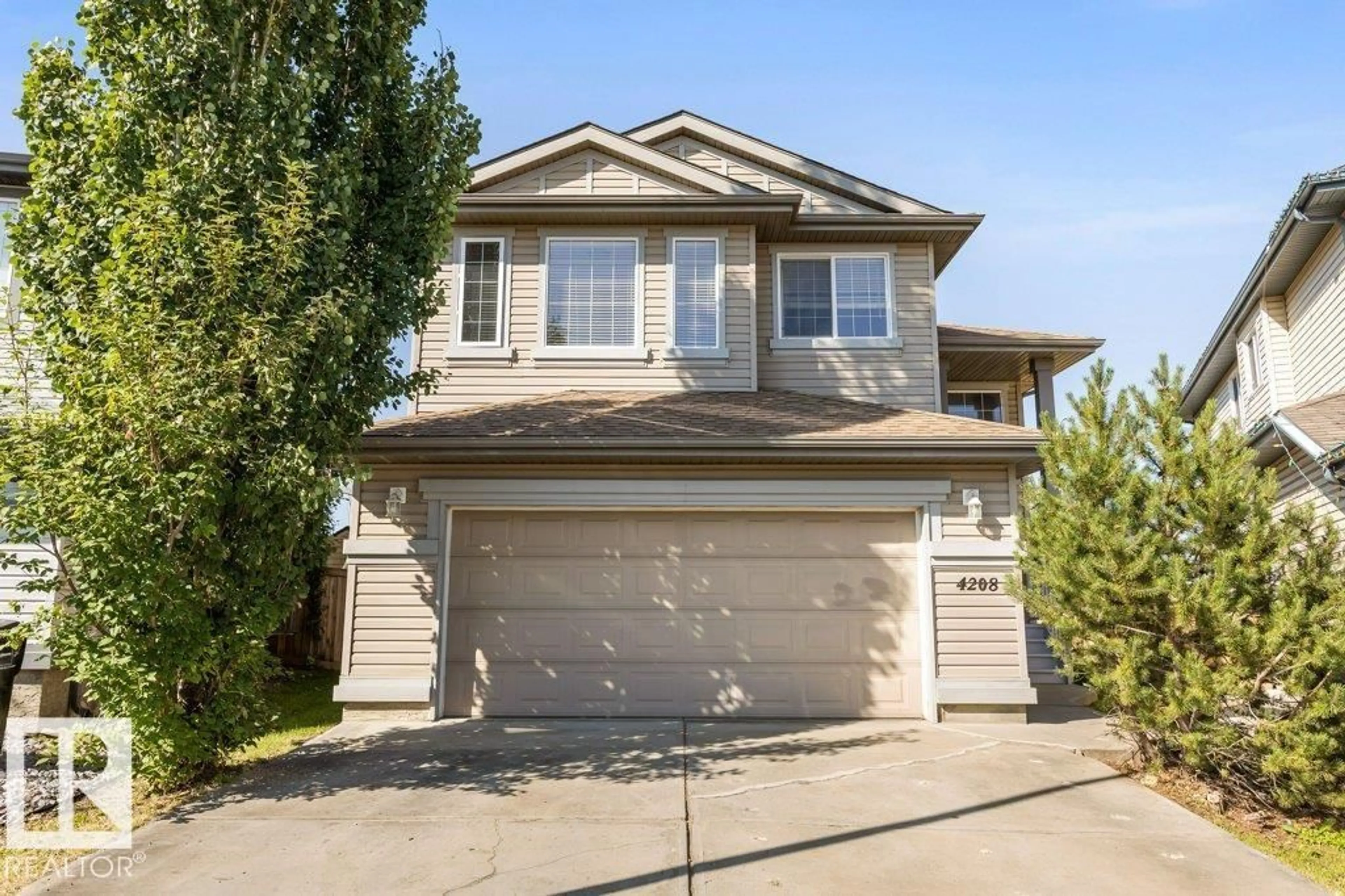 Home with vinyl exterior material, street for 4208 162 AV, Edmonton Alberta T5Y0H8