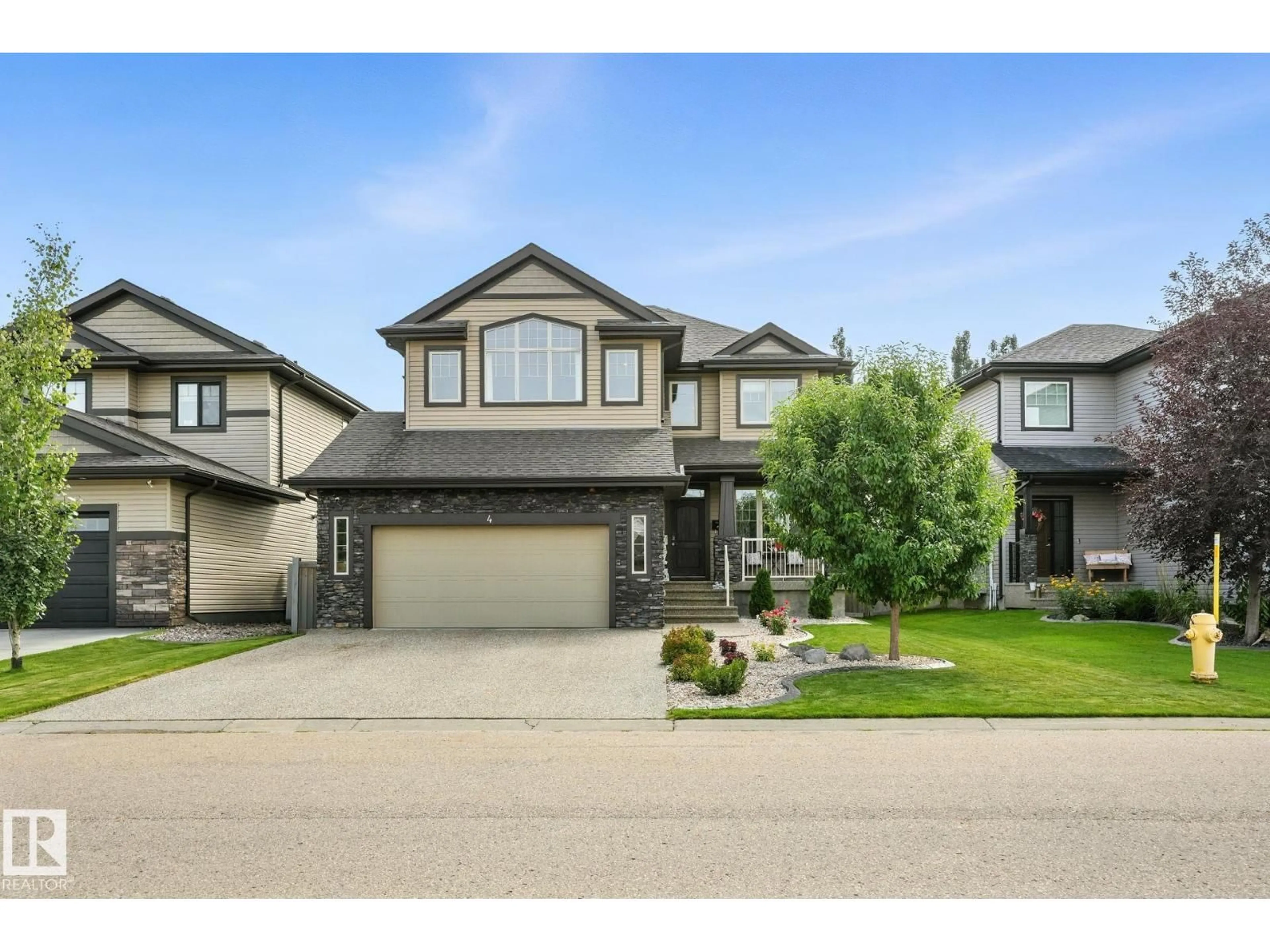 Home with vinyl exterior material, street for 4 LINCOLN, Spruce Grove Alberta T7X0N5