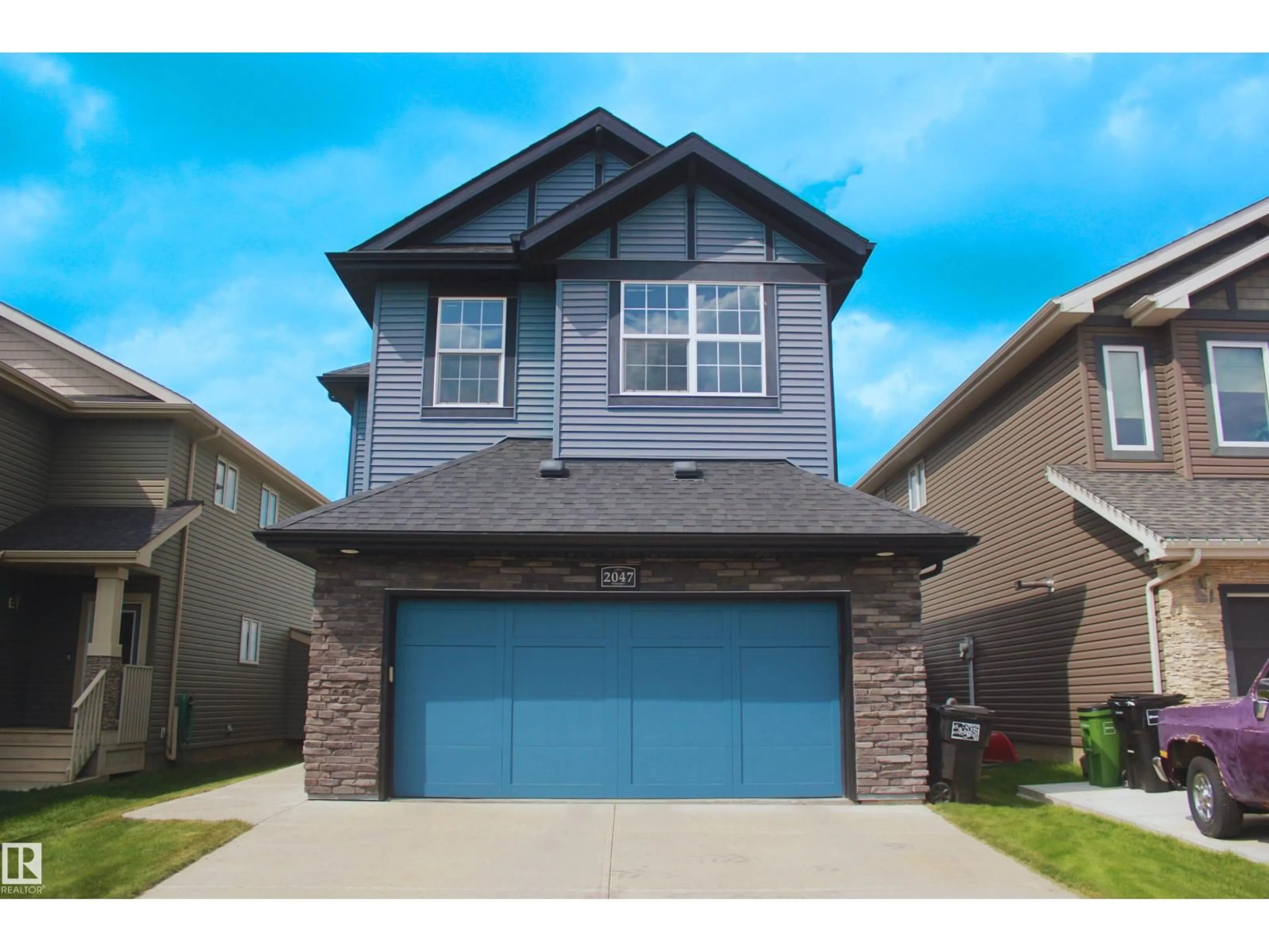 Home with vinyl exterior material, street for NW - 2047 REDTAIL CM, Edmonton Alberta T5S0H3