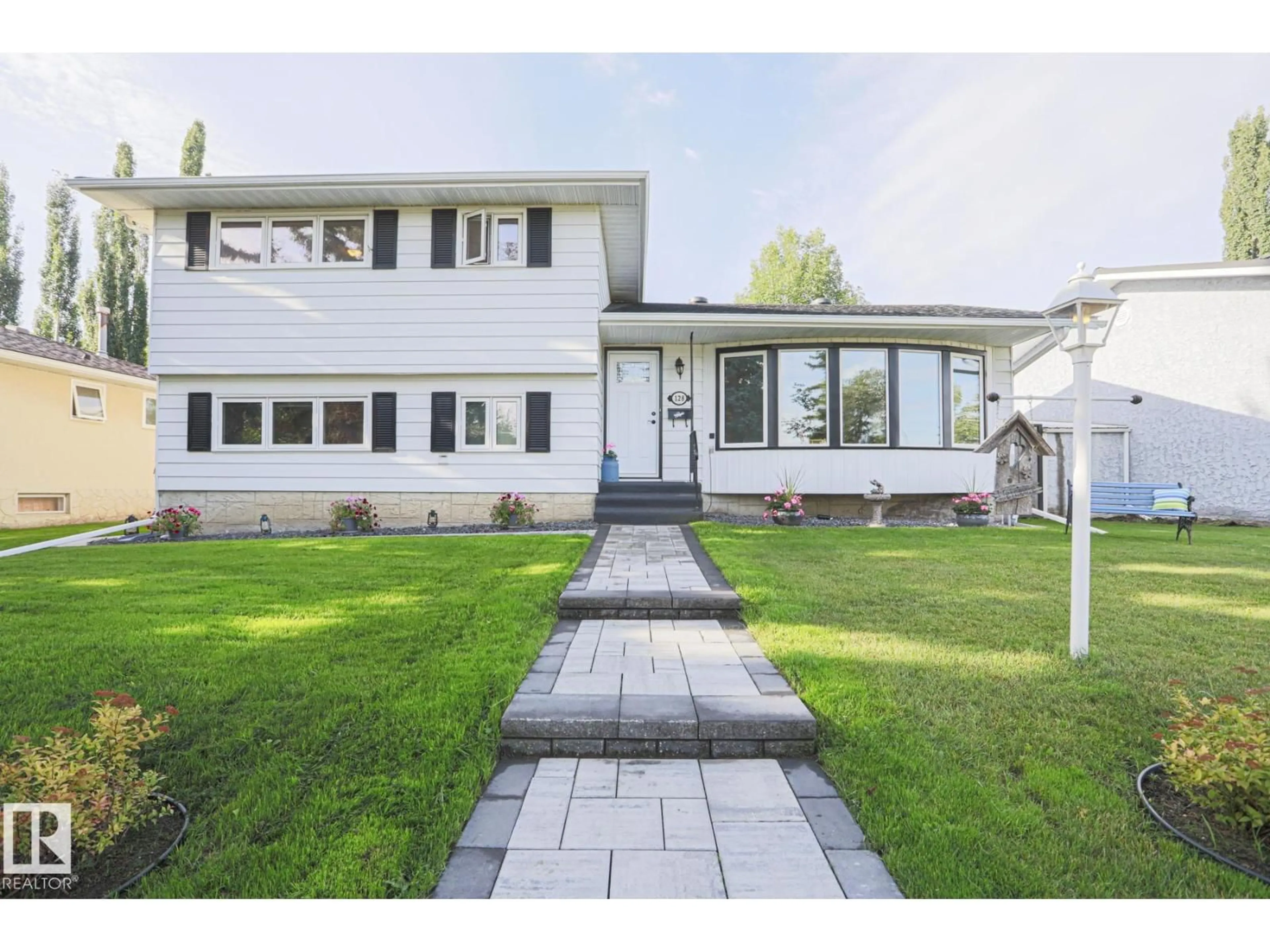 Home with vinyl exterior material, street for 128 BROOKWOOD DR, Spruce Grove Alberta T7X1G7