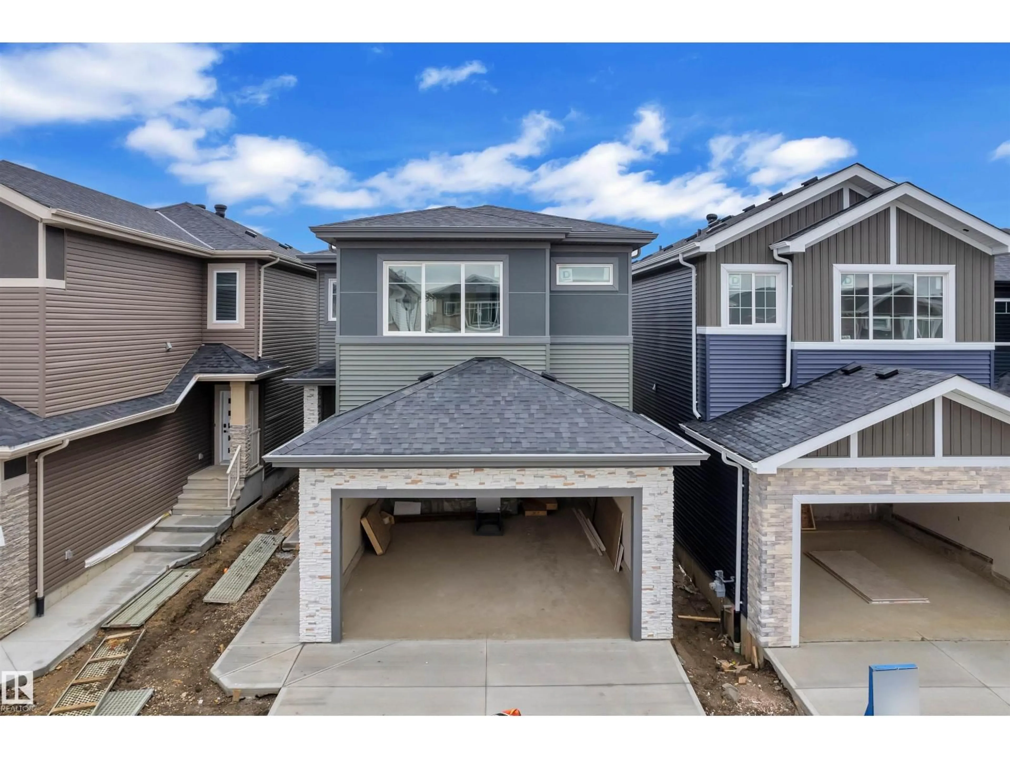 A pic from outside/outdoor area/front of a property/back of a property/a pic from drone, street for 3519 42 AV, Beaumont Alberta T4X3A7