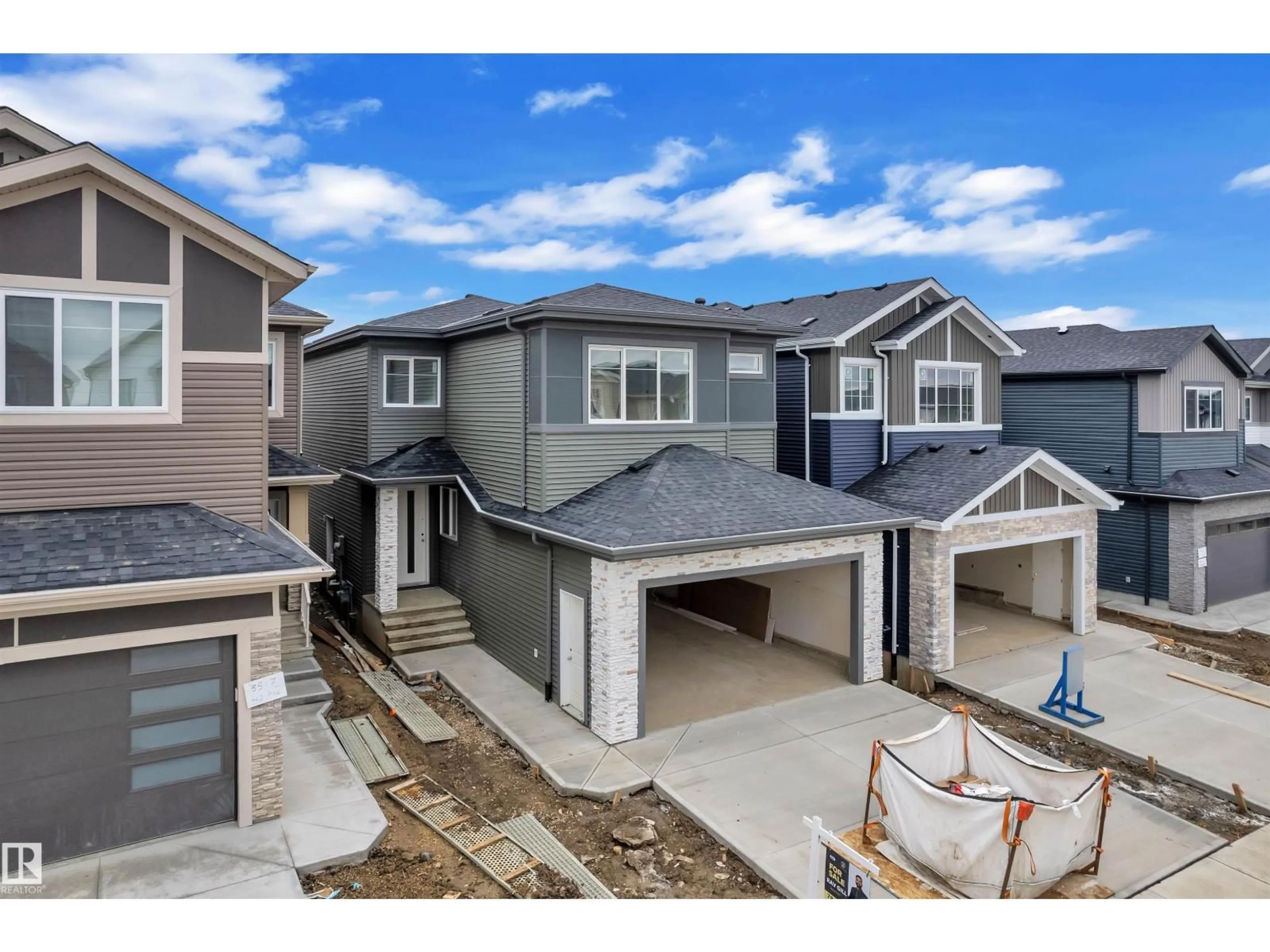 A pic from outside/outdoor area/front of a property/back of a property/a pic from drone, street for 3519 42 AV, Beaumont Alberta T4X3A7