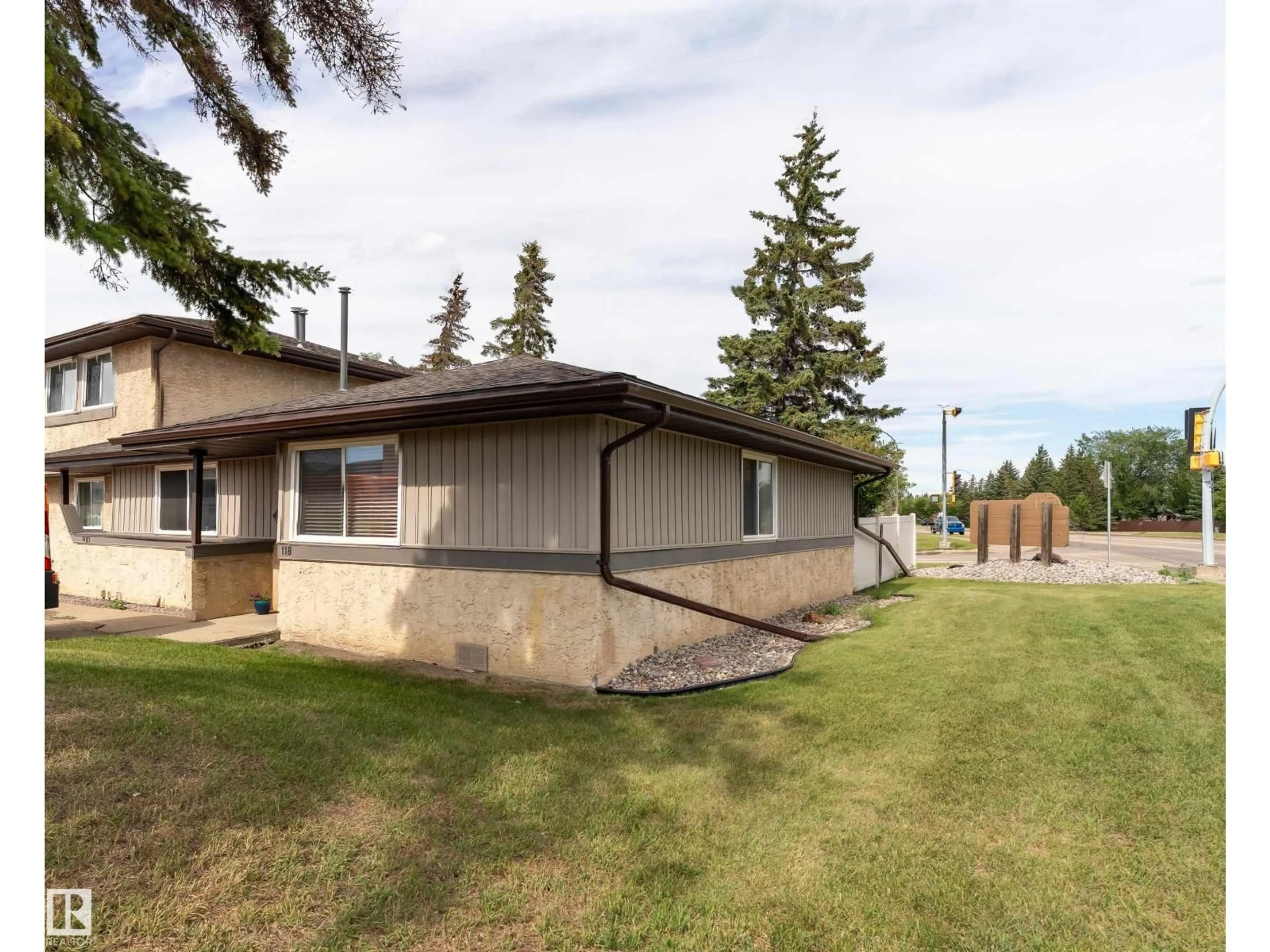 A pic from outside/outdoor area/front of a property/back of a property/a pic from drone, unknown for #118 - 8930 99 AV, Fort Saskatchewan Alberta T8L3L1