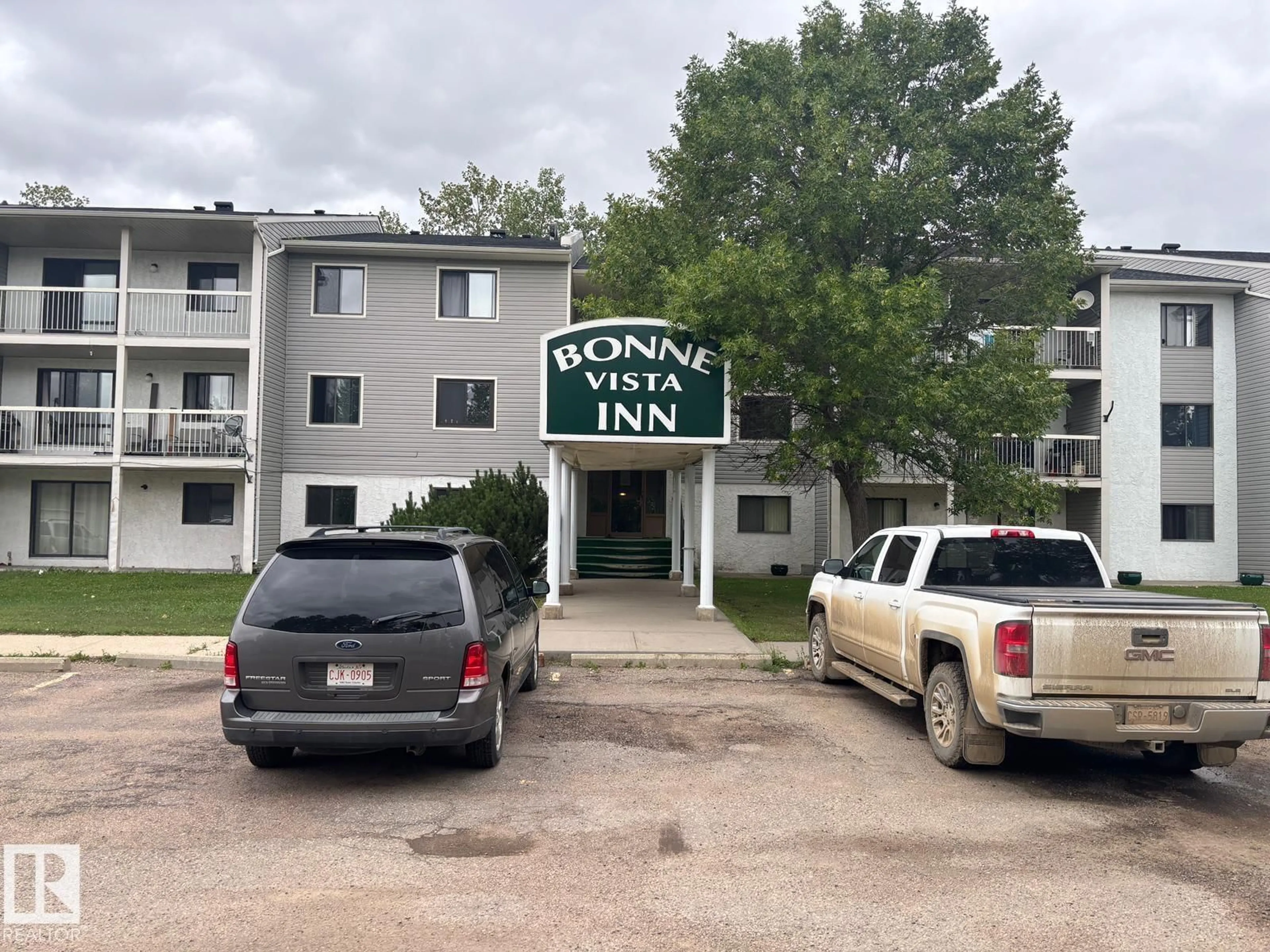 A pic from outside/outdoor area/front of a property/back of a property/a pic from drone, mountain view for 209 - 5705 51 ST, Elk Point Alberta T0A1A0