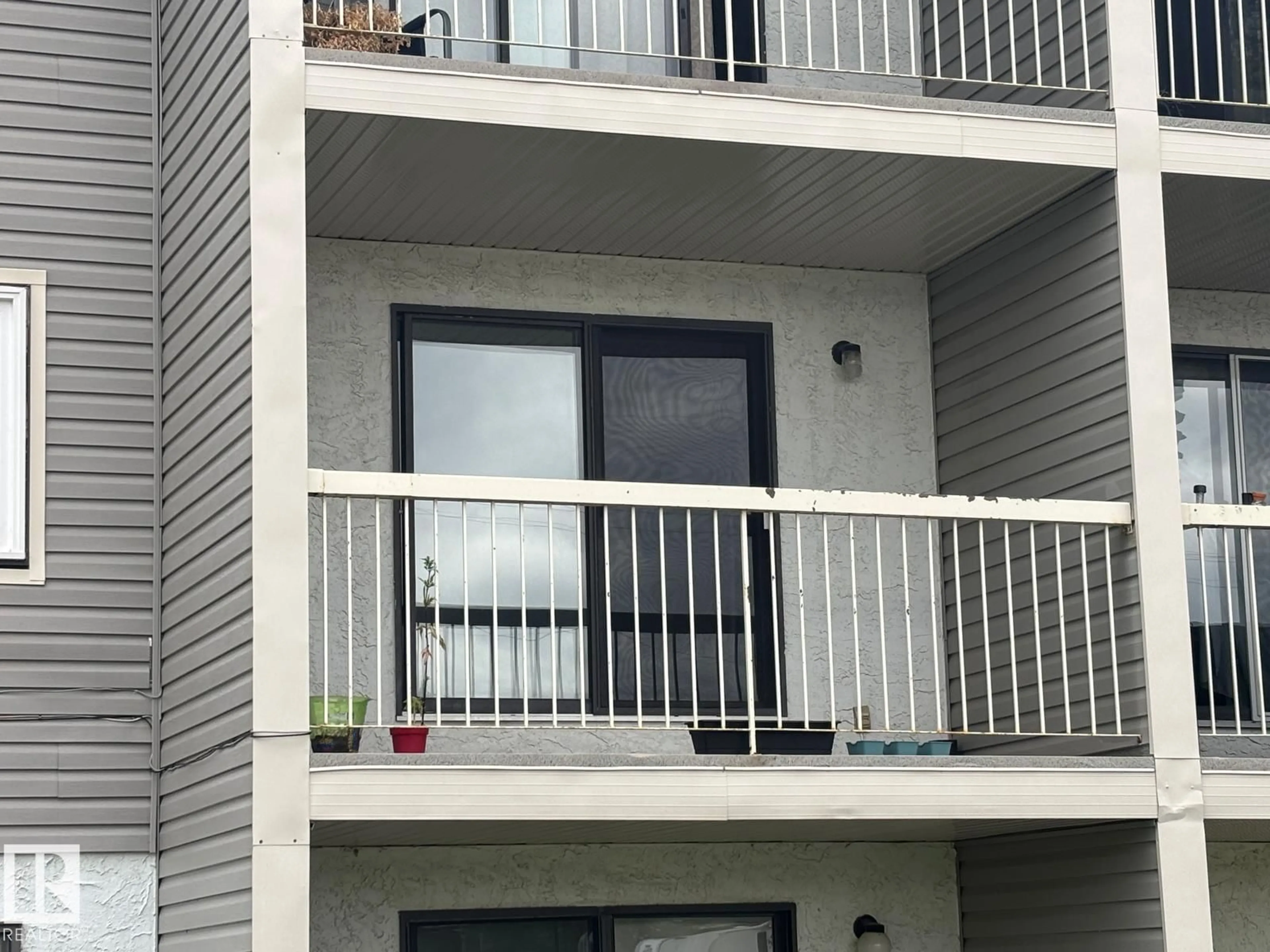 Balcony in the apartment, city buildings view from balcony for 209 - 5705 51 ST, Elk Point Alberta T0A1A0