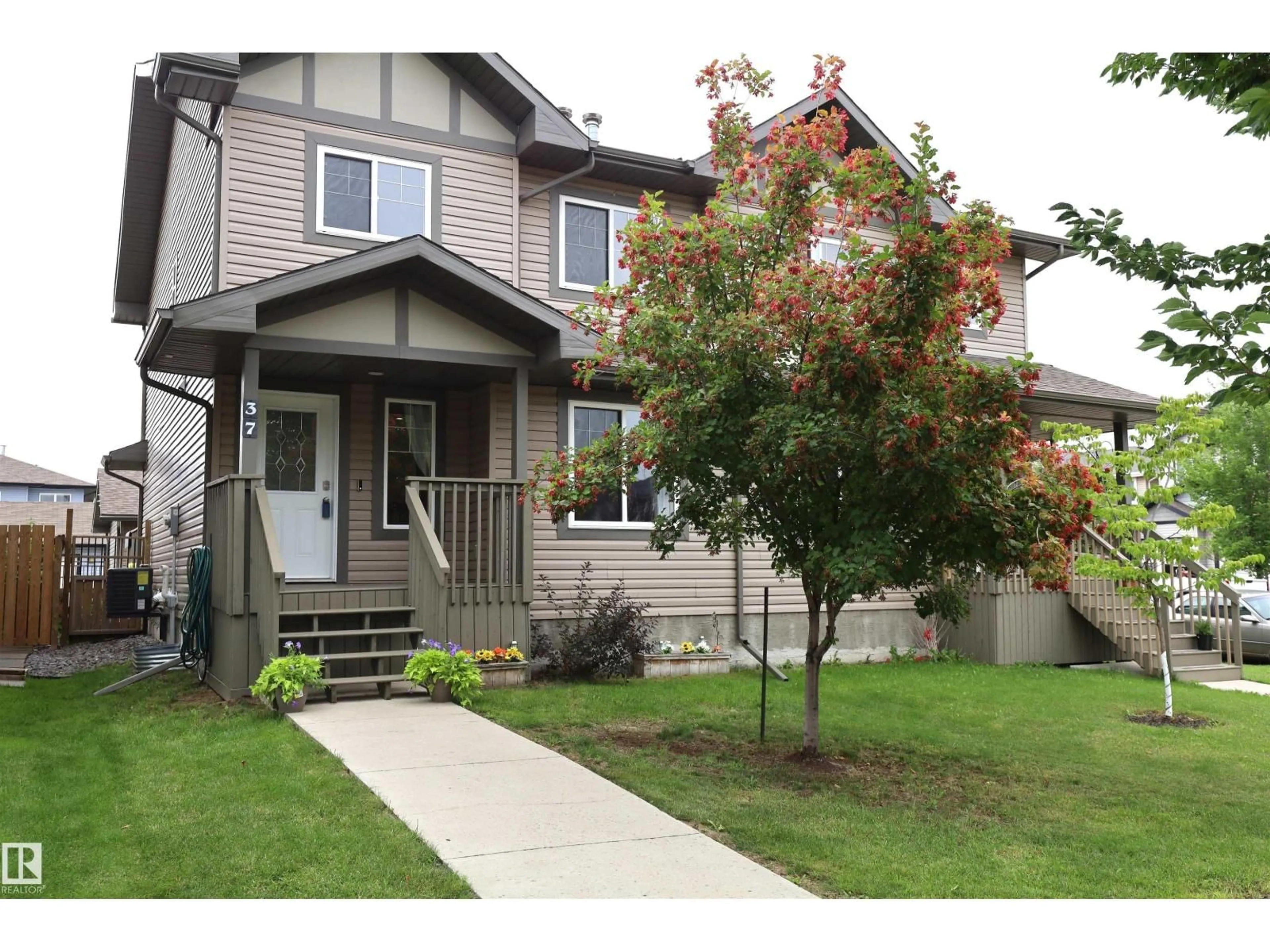 Home with vinyl exterior material, street for 37 RADCLIFFE WD, Fort Saskatchewan Alberta T8L0M6